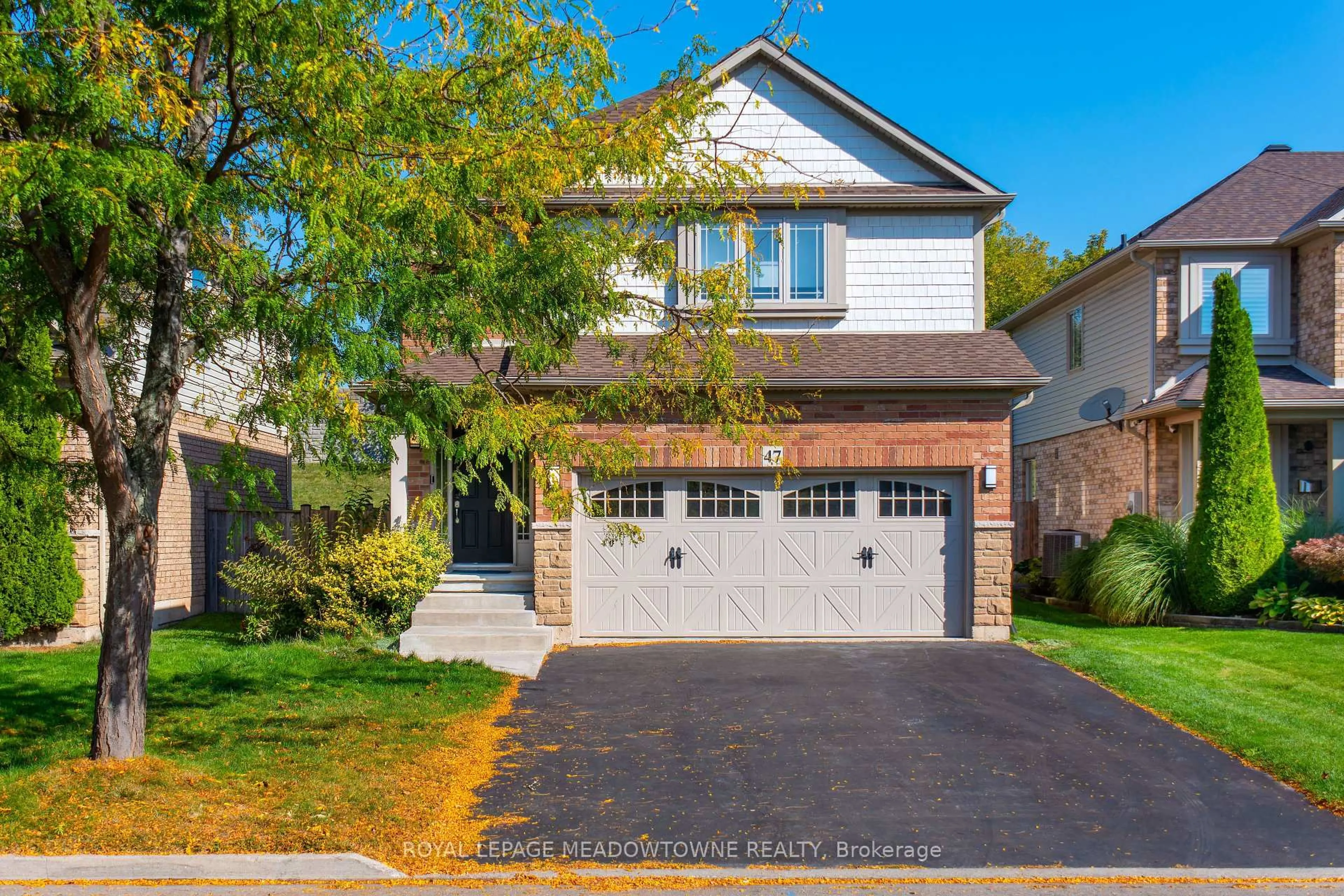 Home with brick exterior material, street for 47 Plum Tree Lane, Grimsby Ontario L3M 5T5