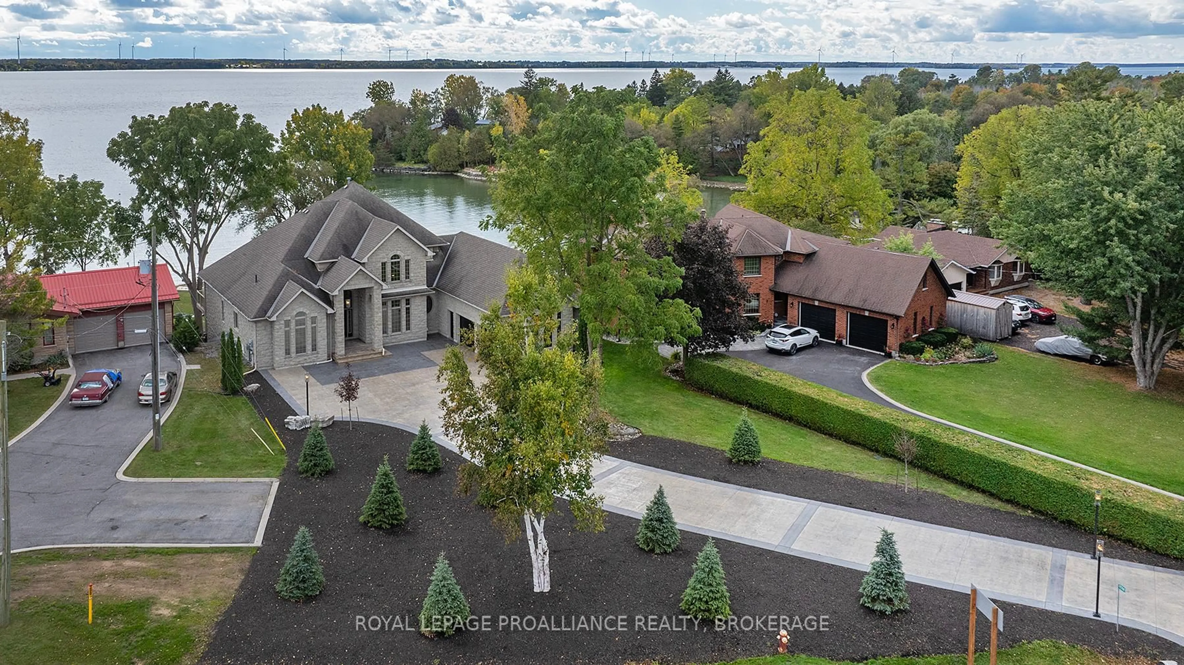 A pic from outside/outdoor area/front of a property/back of a property/a pic from drone, water/lake/river/ocean view for 4744 Bath Rd, Bath Ontario K0H 1G0