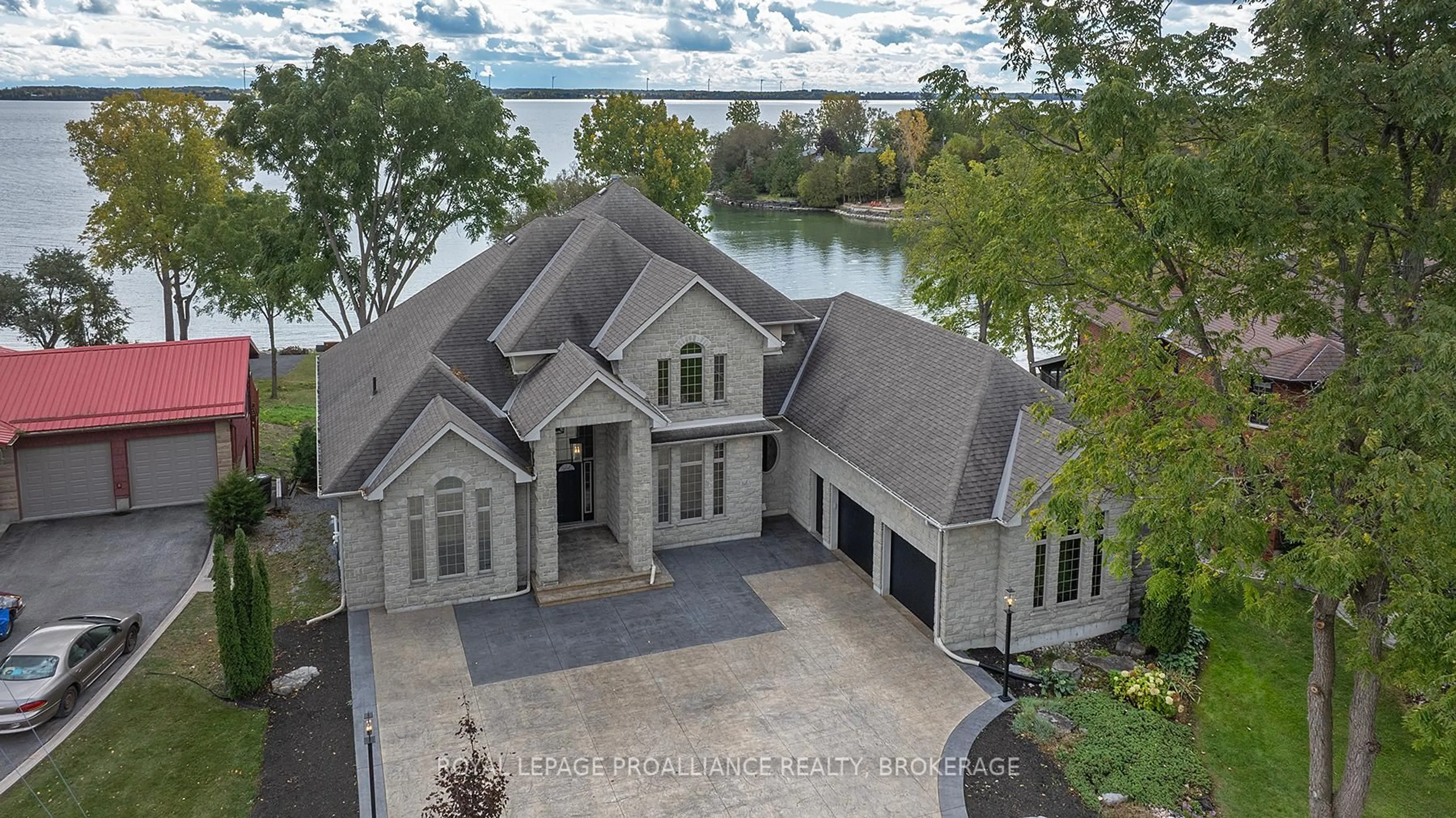 A pic from outside/outdoor area/front of a property/back of a property/a pic from drone, water/lake/river/ocean view for 4744 Bath Rd, Bath Ontario K0H 1G0