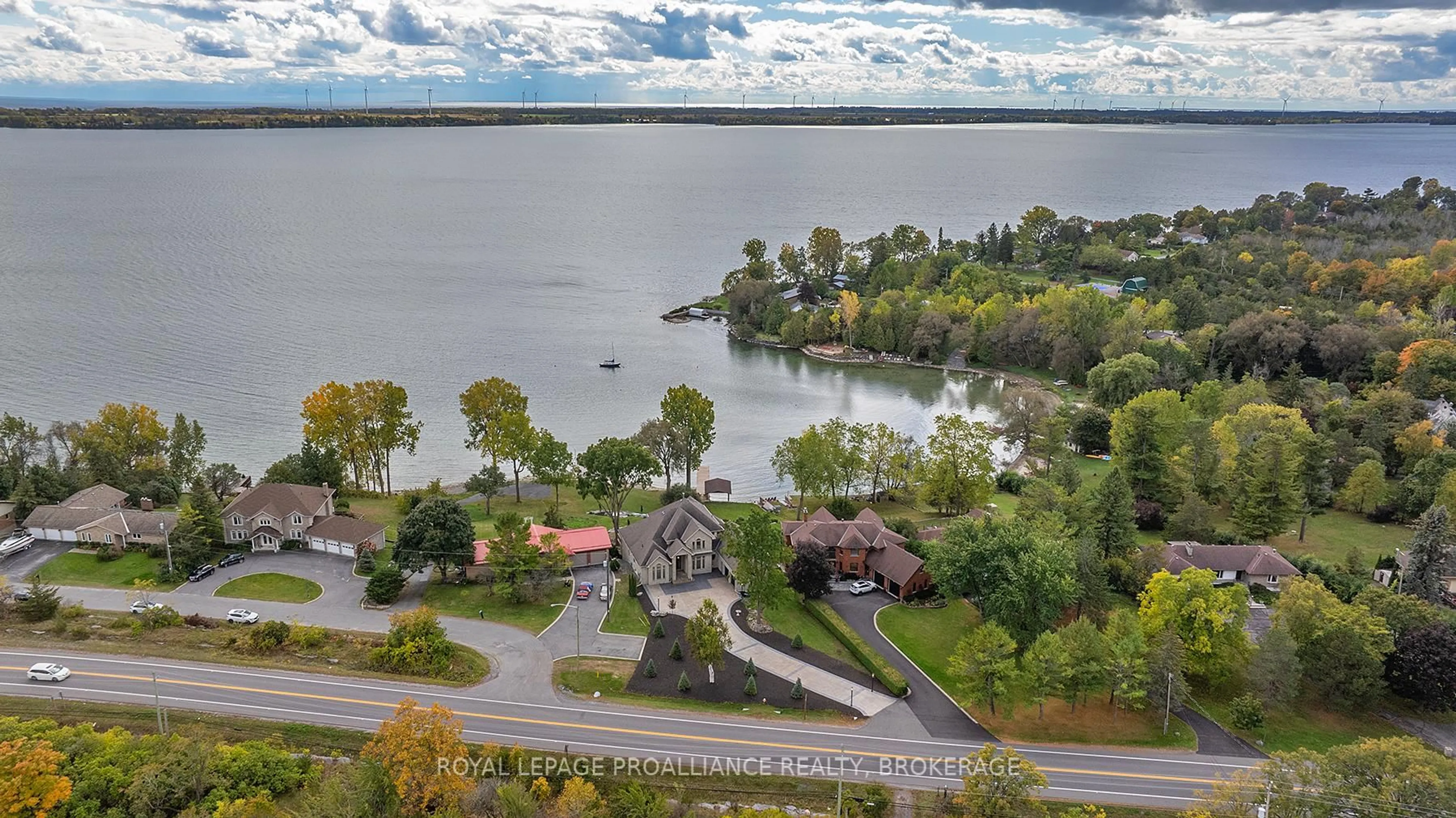 A pic from outside/outdoor area/front of a property/back of a property/a pic from drone, water/lake/river/ocean view for 4744 Bath Rd, Bath Ontario K0H 1G0