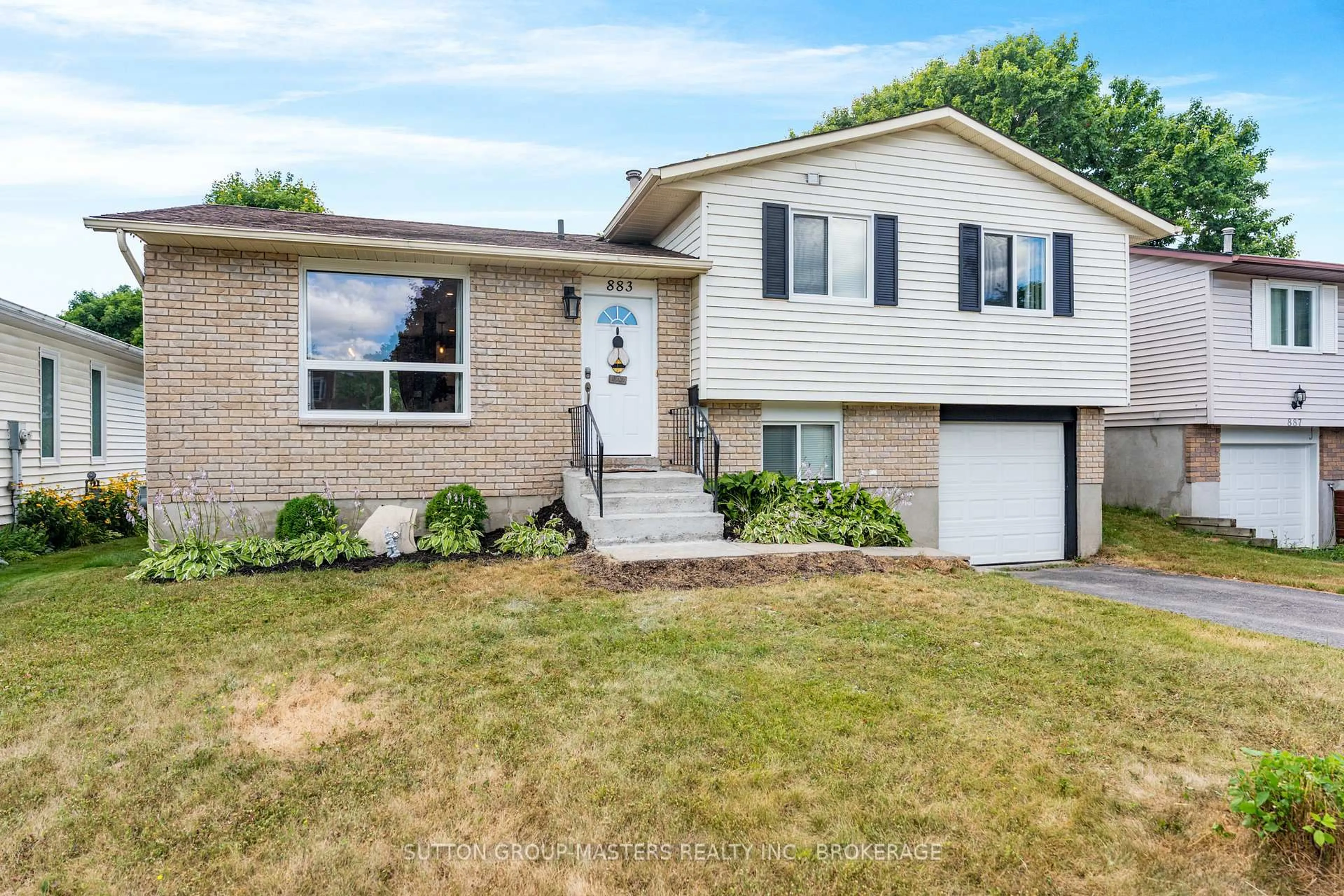 Home with brick exterior material, street for 883 Old Colony Rd, Kingston Ontario K7P 1S1