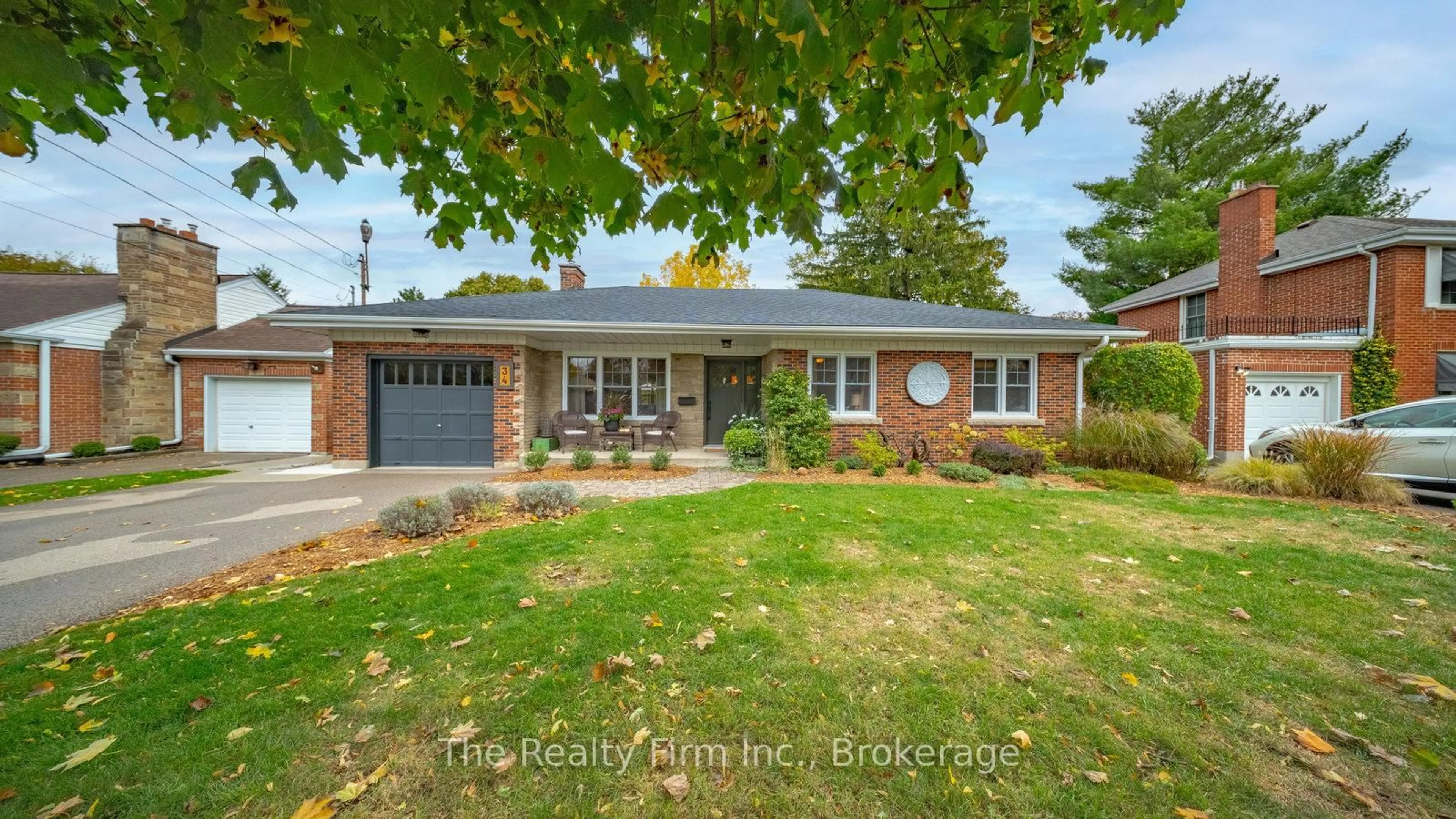 Home with brick exterior material, street for 34 Springfield Dr, Brantford Ontario N3R 1N3