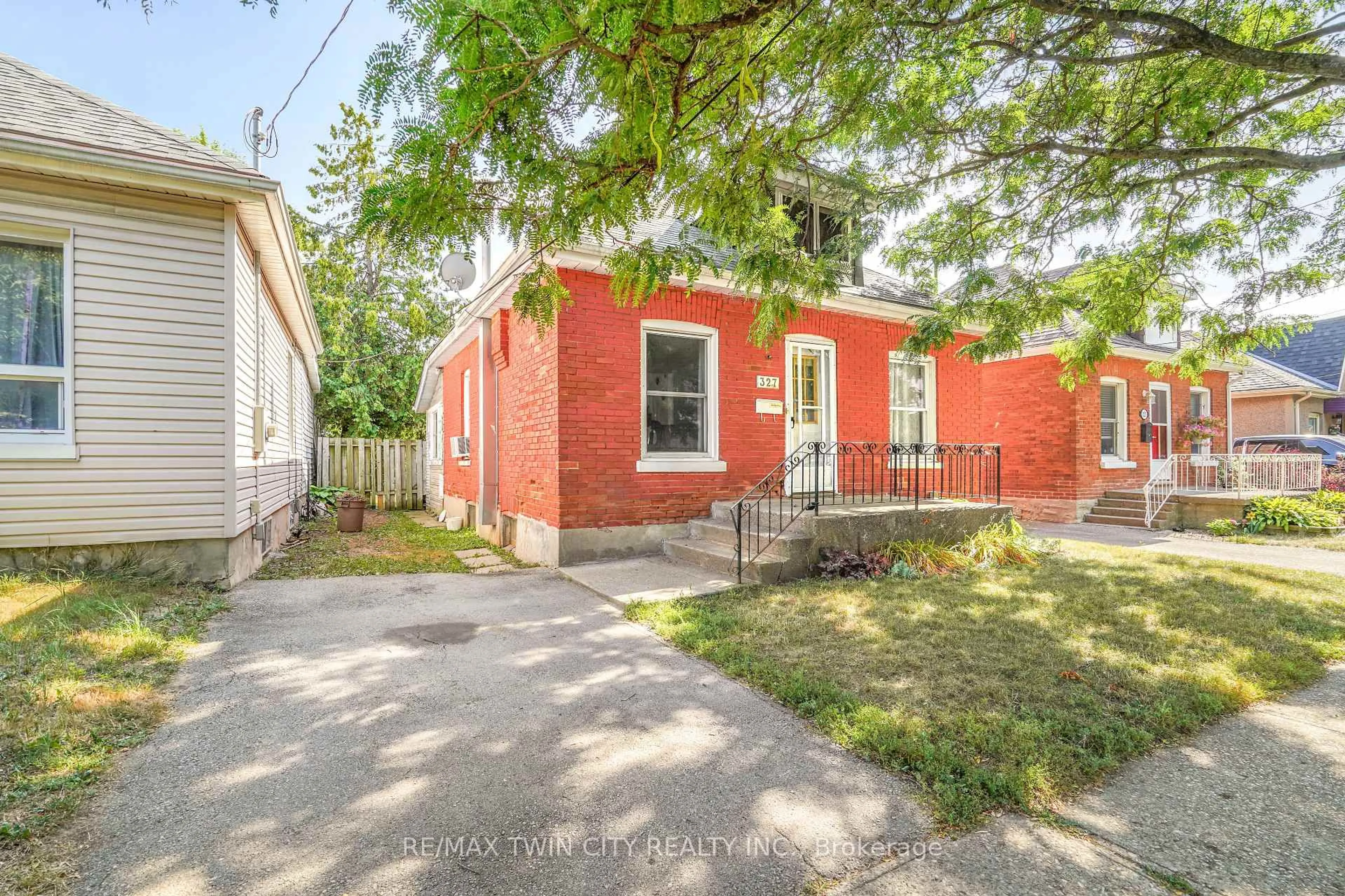 Home with brick exterior material, street for 327 Sheridan St, Brantford Ontario N3S 4R8