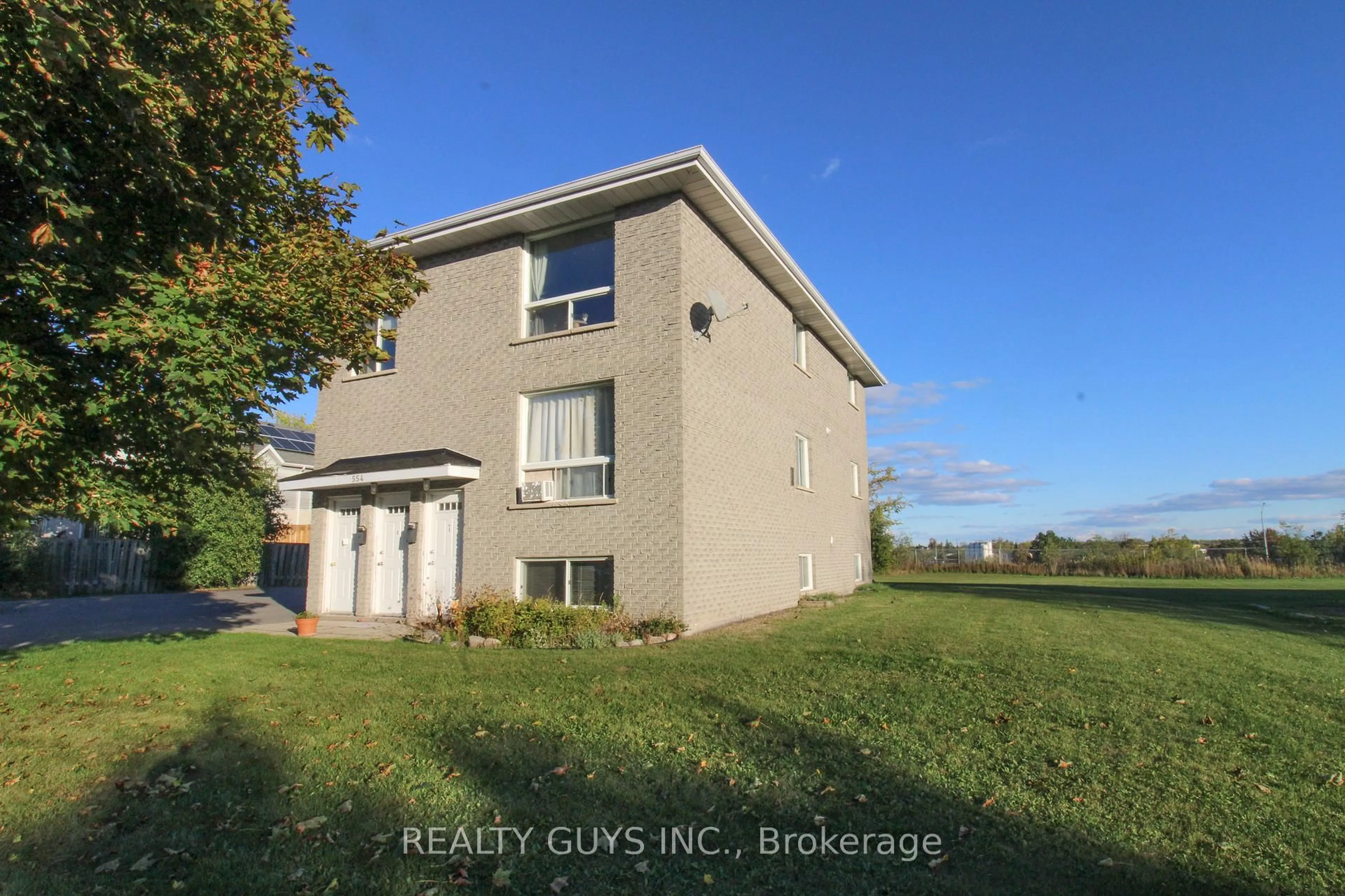 A pic from outside/outdoor area/front of a property/back of a property/a pic from drone, water/lake/river/ocean view for 554 Crystal Dr, Peterborough Ontario K9J 8H5