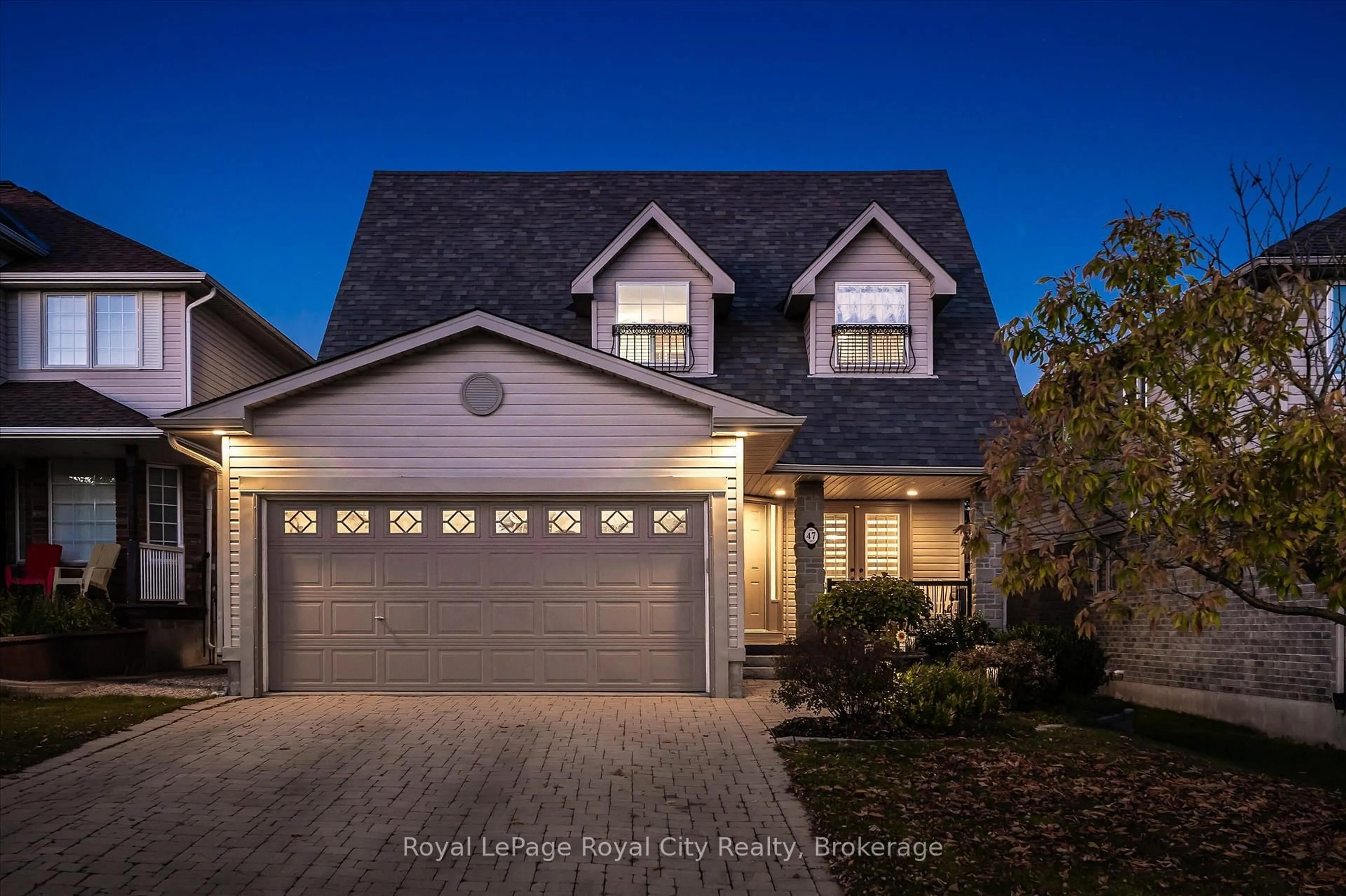 Home with vinyl exterior material, street for 47 Norton Dr, Guelph Ontario N1E 7K9