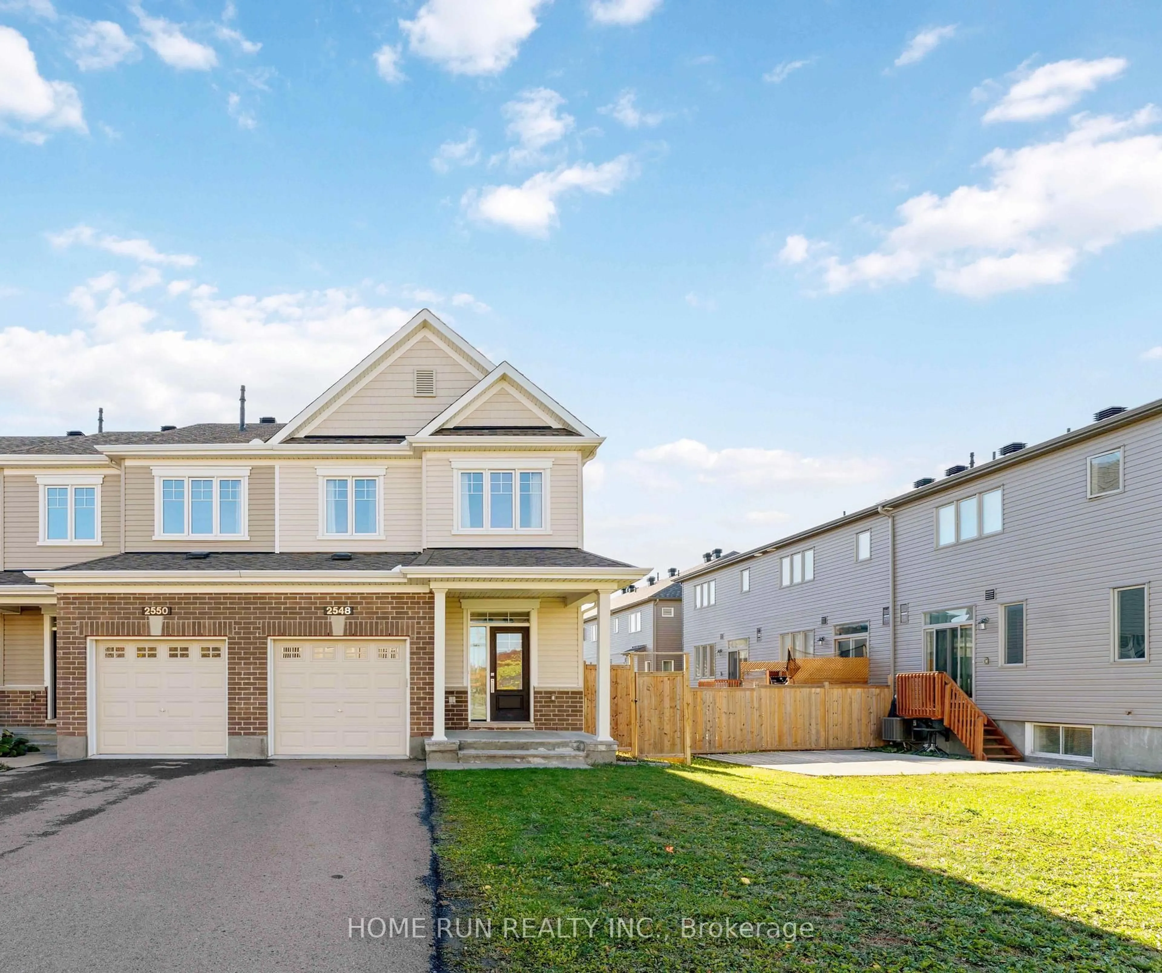 Home with vinyl exterior material, street for 2548 Waterlilly Way, Ottawa Ontario K2J 0K6