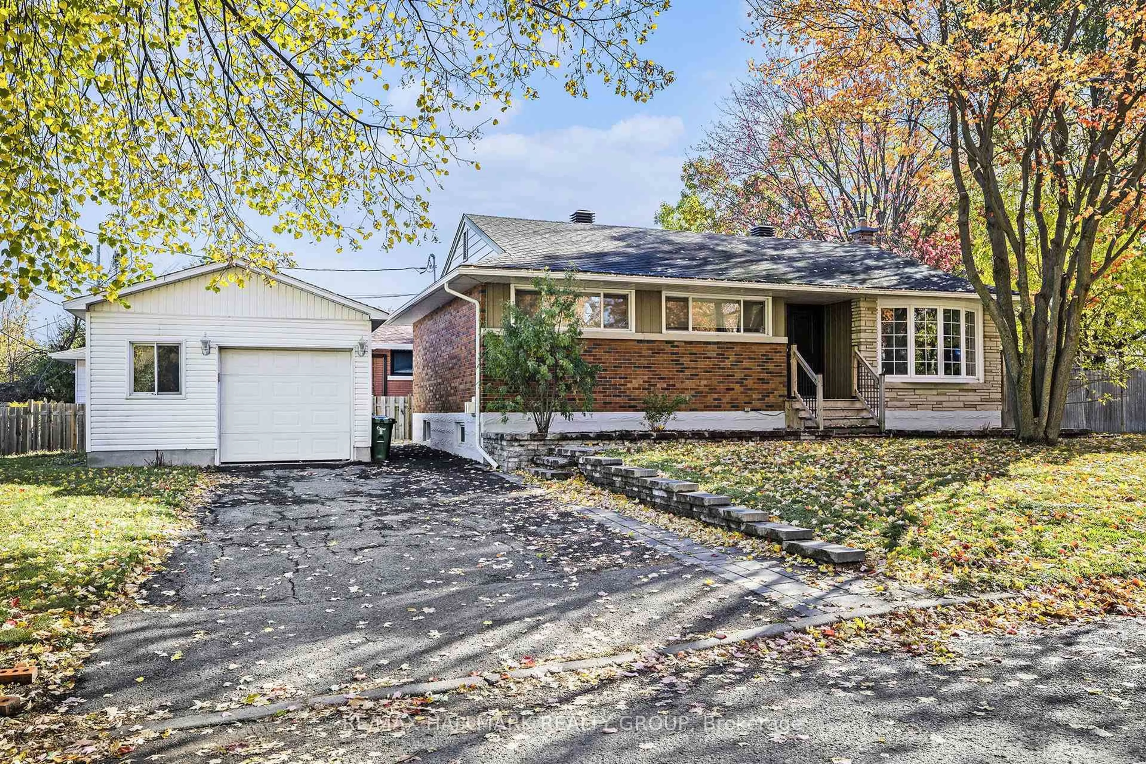 Home with brick exterior material, street for 715 Holt Cres, Ottawa Ontario K1G 2Y4