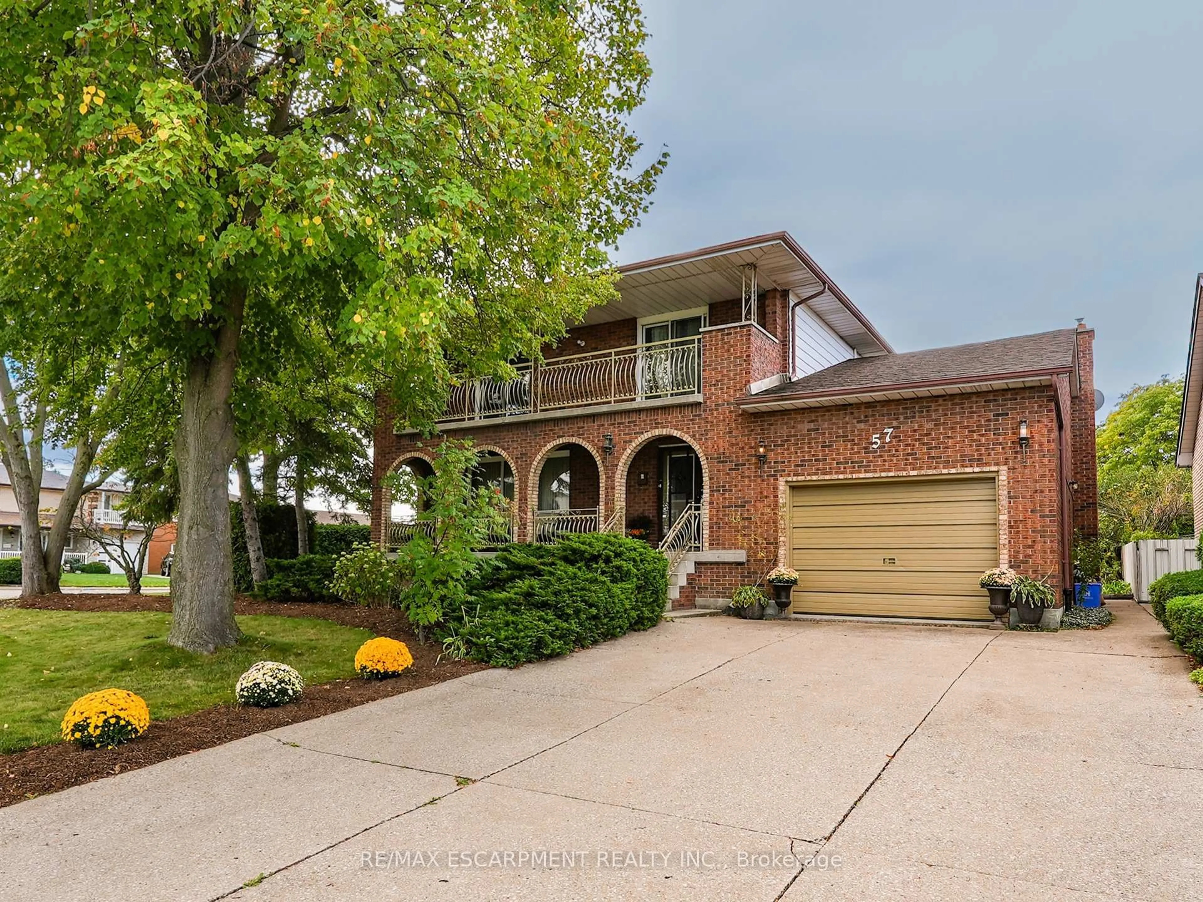 Home with brick exterior material, street for 57 Neil Ave, Hamilton Ontario L8G 2N1