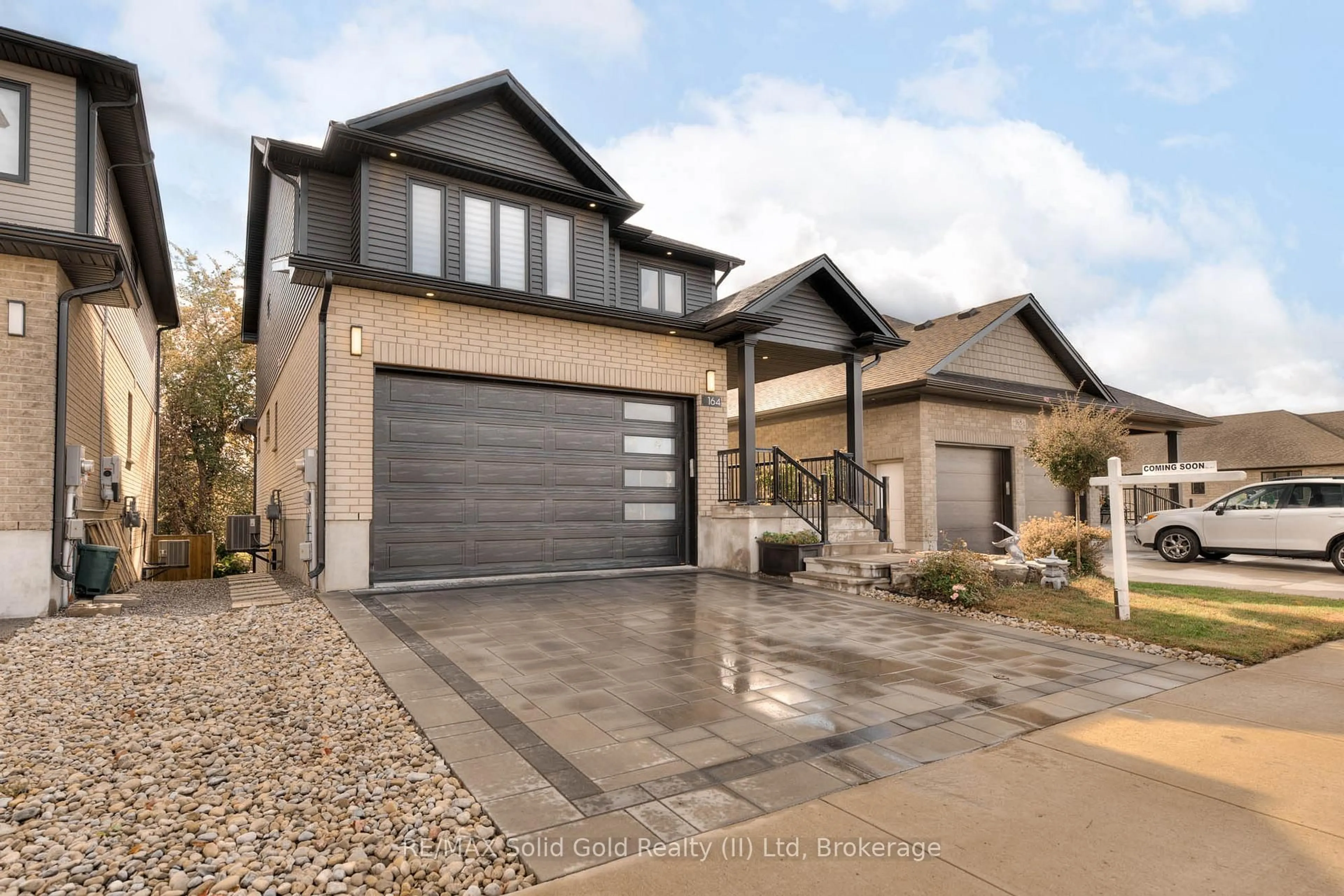 Home with brick exterior material, street for 164 Timber Trail Rd, Woolwich Ontario N3B 0E3