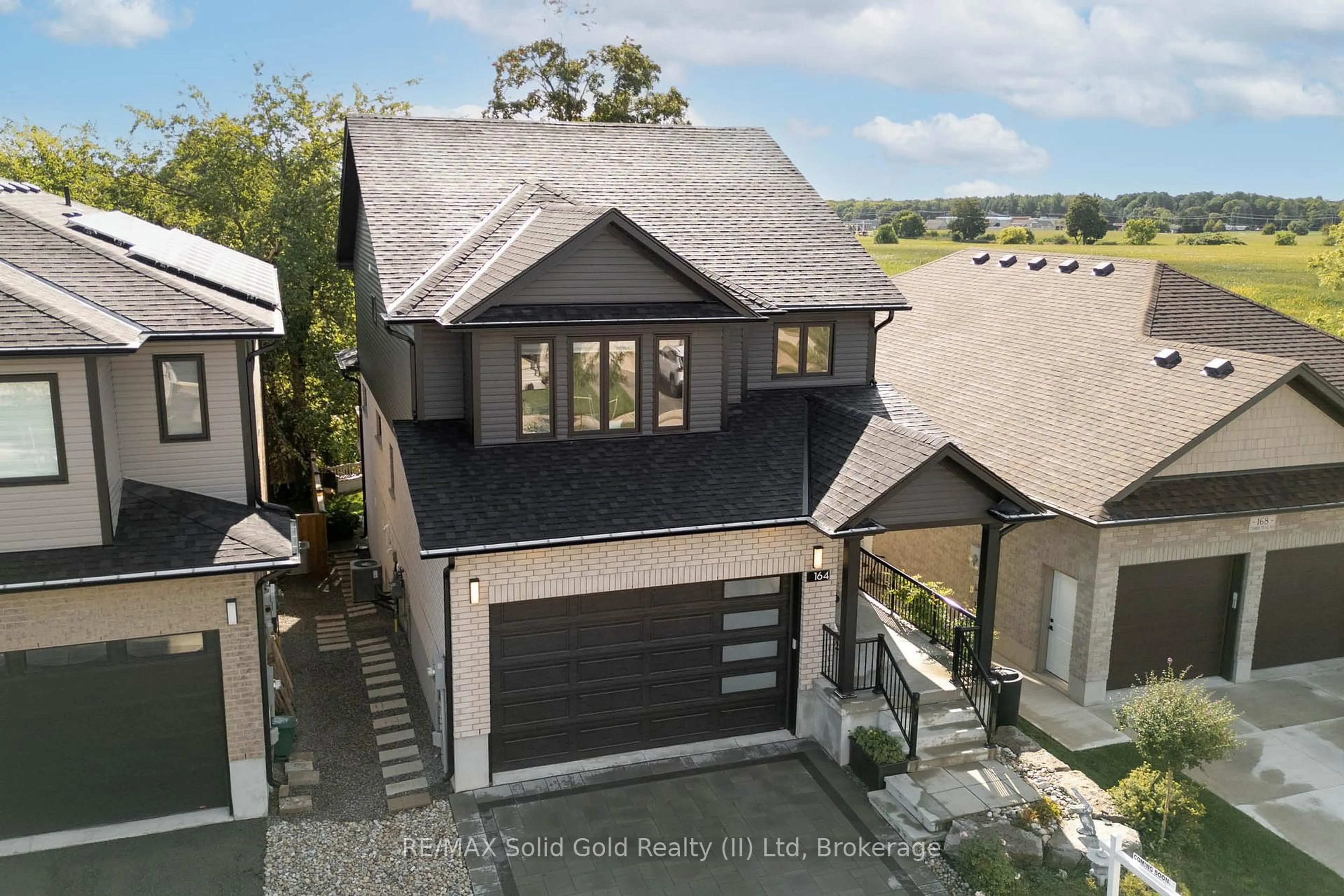 A pic from outside/outdoor area/front of a property/back of a property/a pic from drone, street for 164 Timber Trail Rd, Woolwich Ontario N3B 0E3