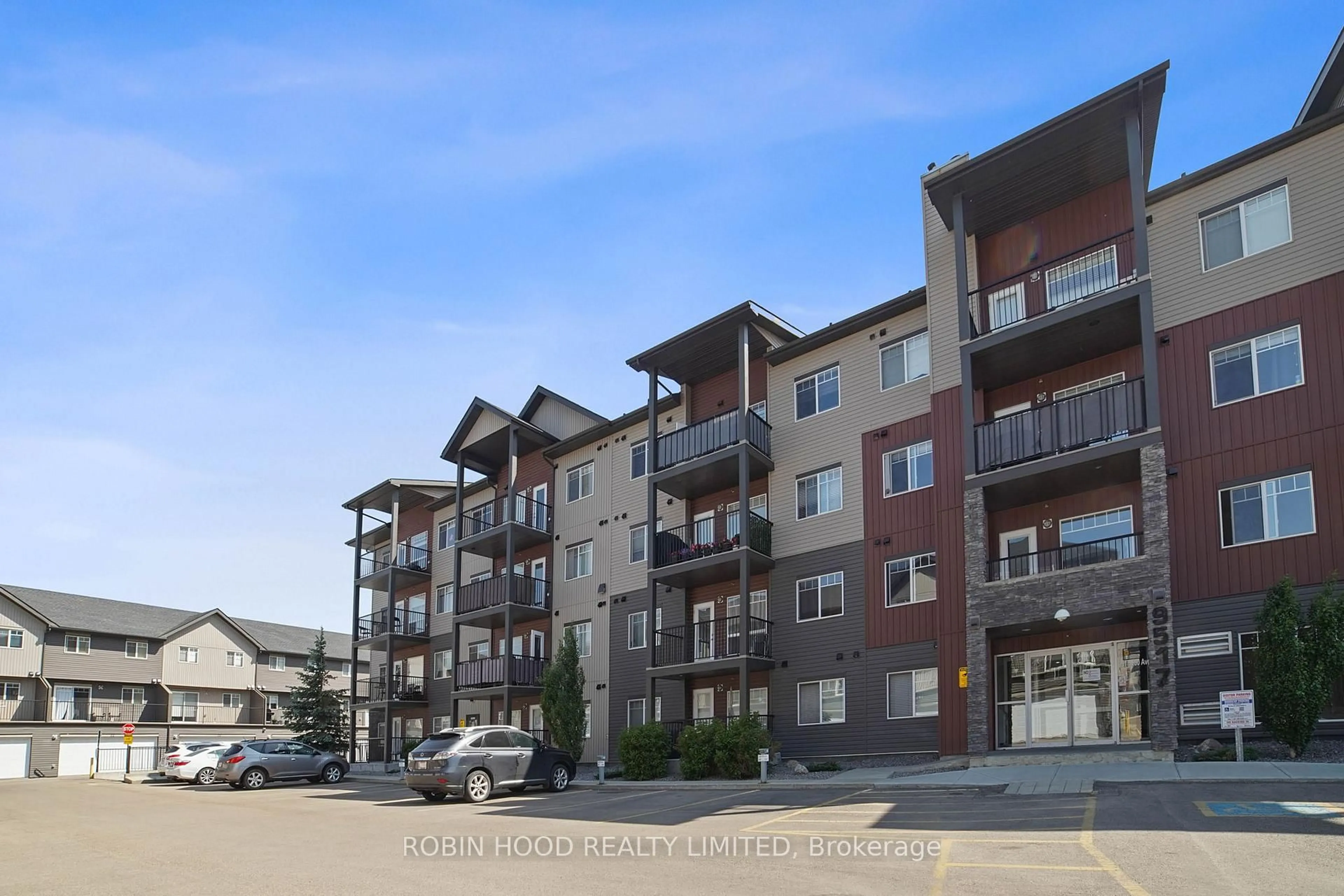 A pic from outside/outdoor area/front of a property/back of a property/a pic from drone, unknown for 9517 160 Ave #205, Out of Area Alberta T5Z 0M4