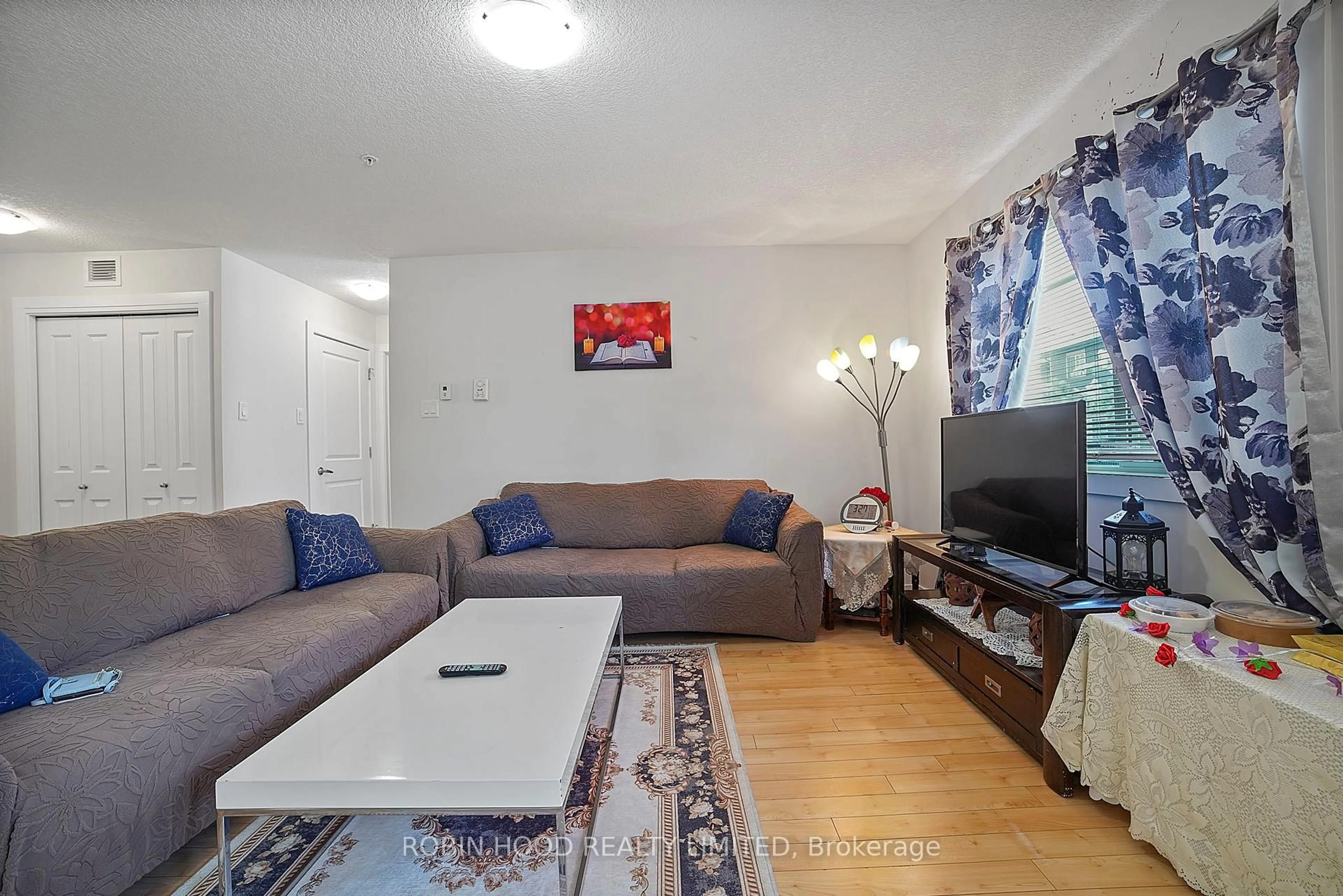 Living room with furniture, unknown for 9517 160 Ave #205, Out of Area Alberta T5Z 0M4