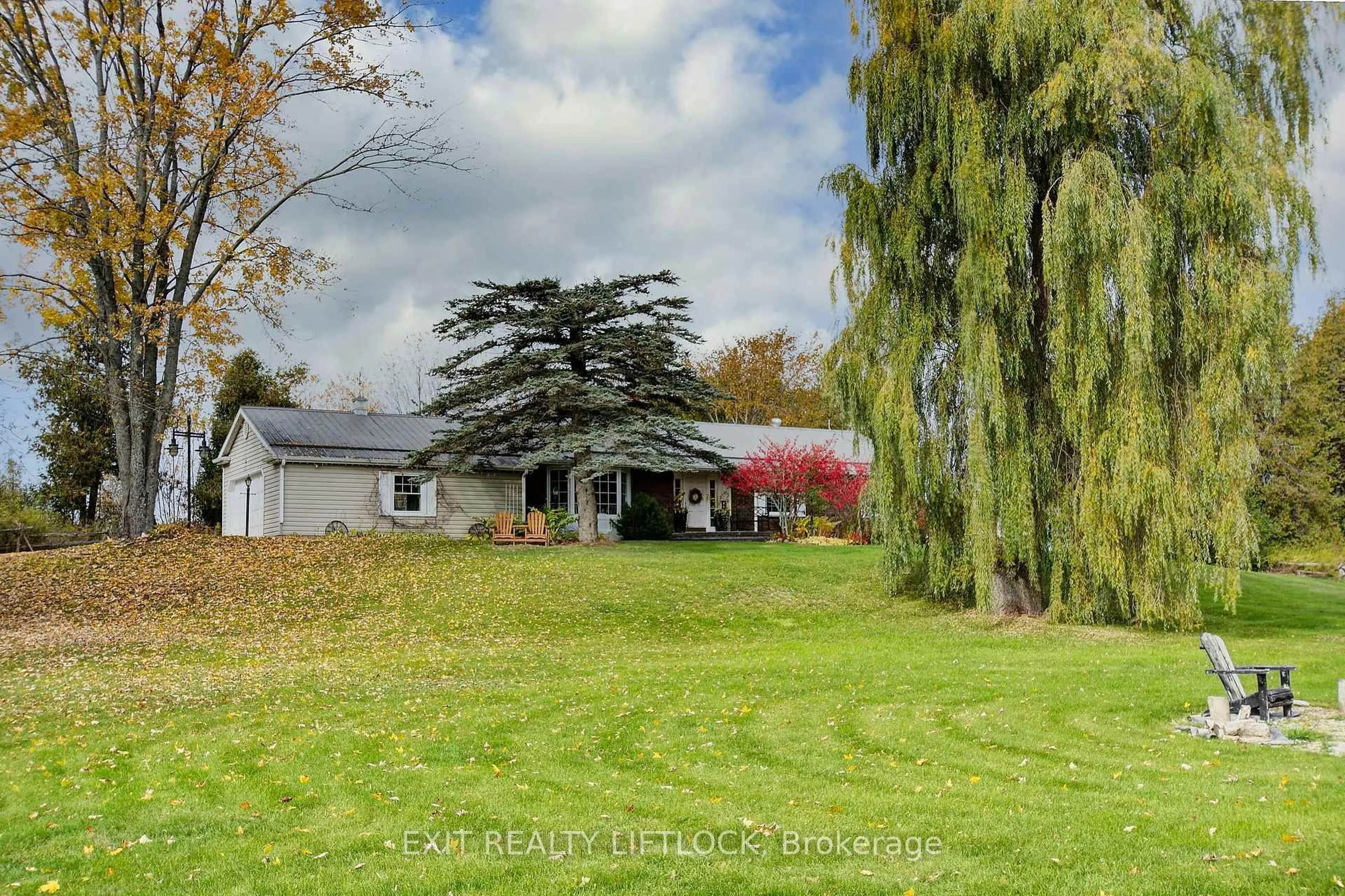 A pic from outside/outdoor area/front of a property/back of a property/a pic from drone, water/lake/river/ocean view for 544 County Road 8, Douro-Dummer Ontario K0L 2H0