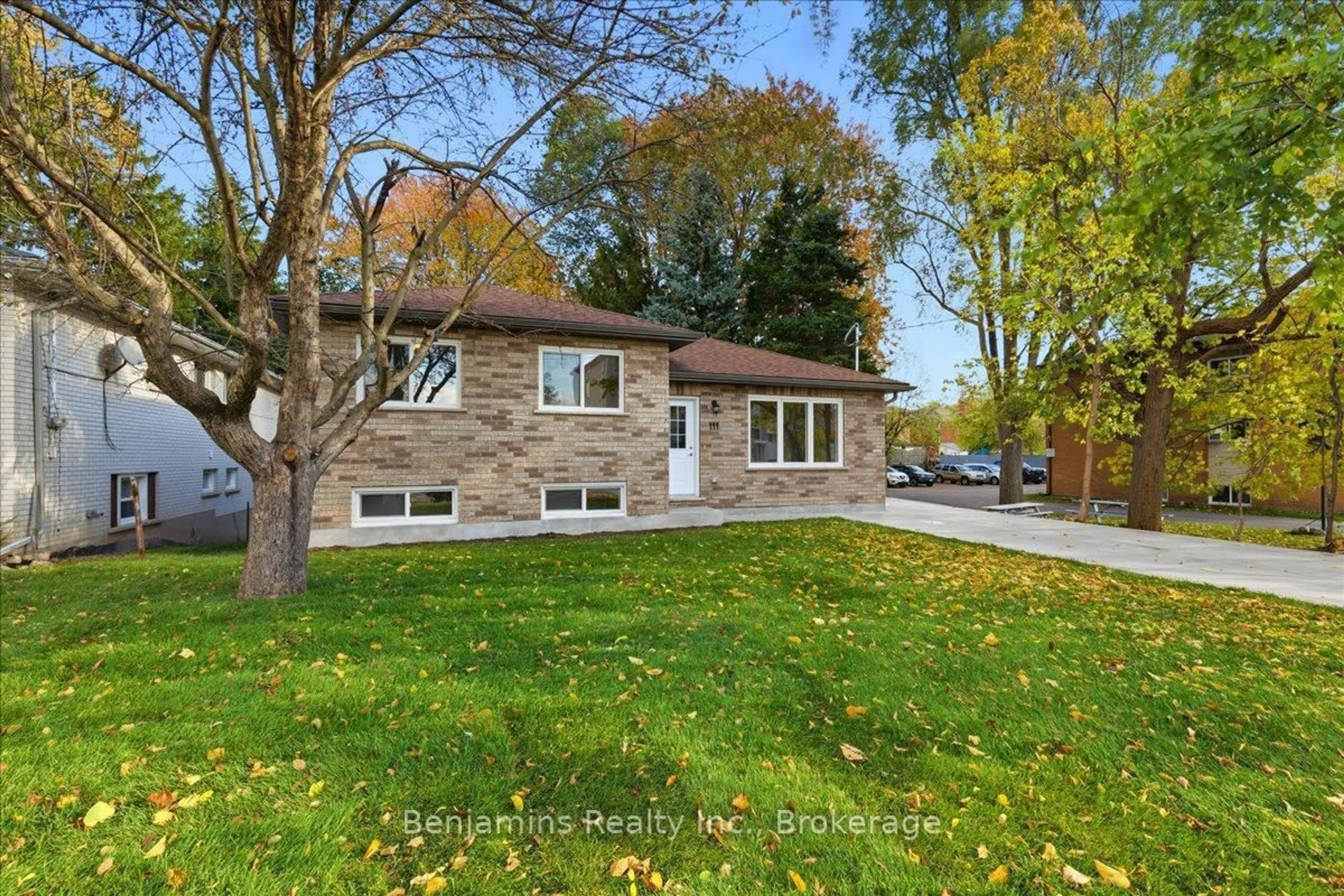 Home with brick exterior material, street for 111 2 Ave, Kitchener Ontario N2C 1N4