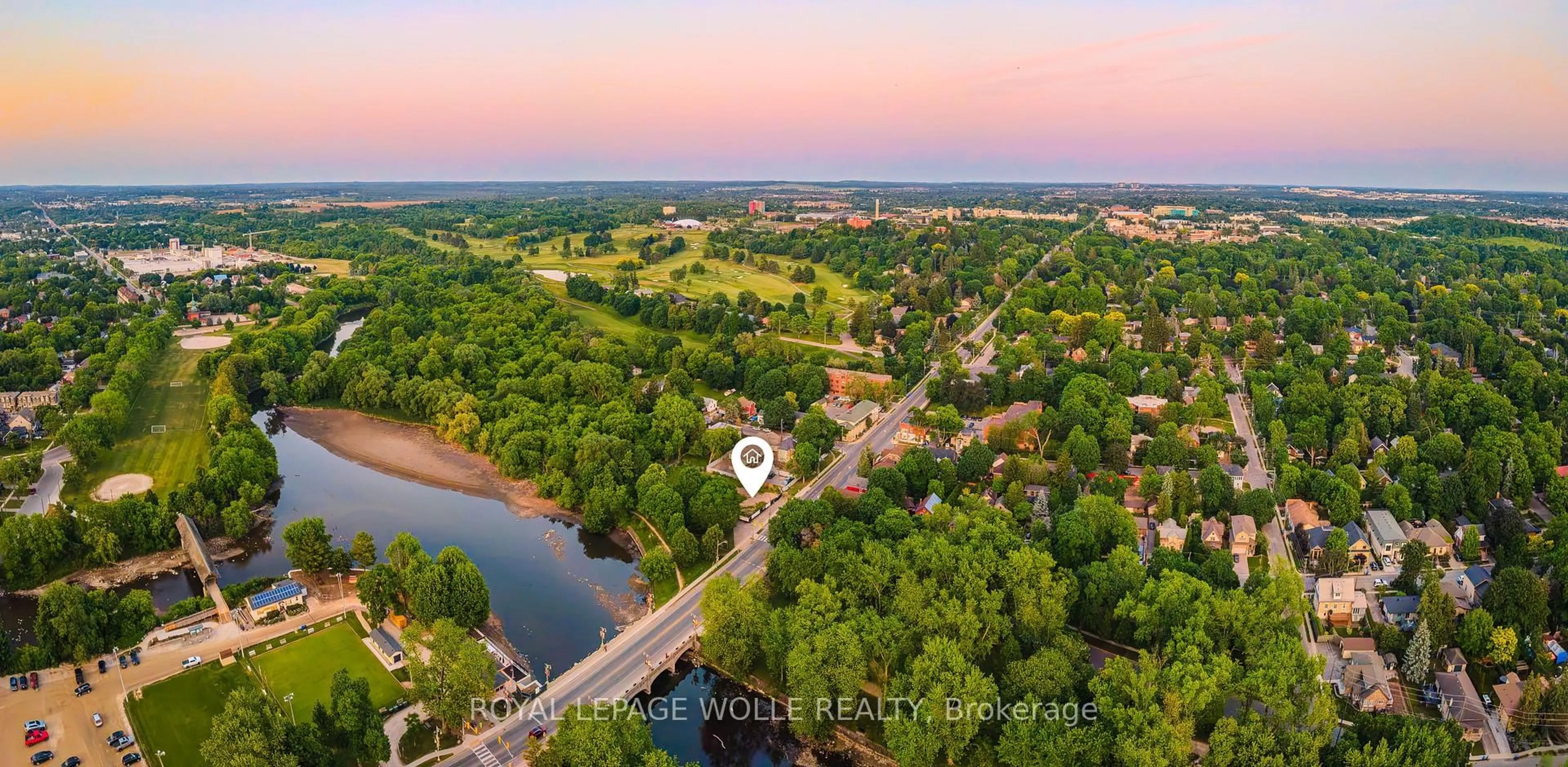 A pic from outside/outdoor area/front of a property/back of a property/a pic from drone, water/lake/river/ocean view for 180 Gordon St #7, Guelph Ontario N1G 1X1