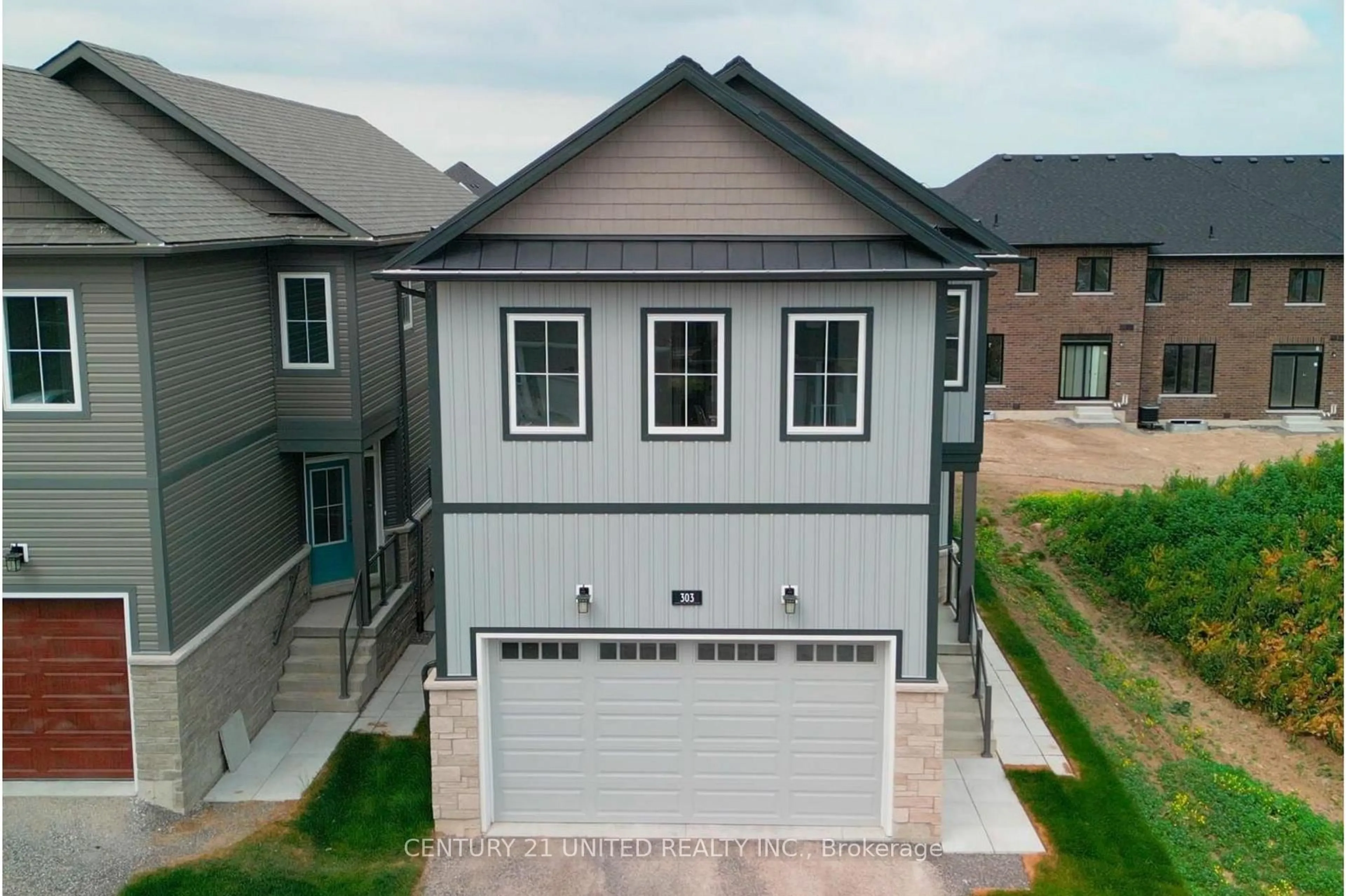 A pic from outside/outdoor area/front of a property/back of a property/a pic from drone, street for 303 Mullighan Gdns, Peterborough Ontario K0K 0G3