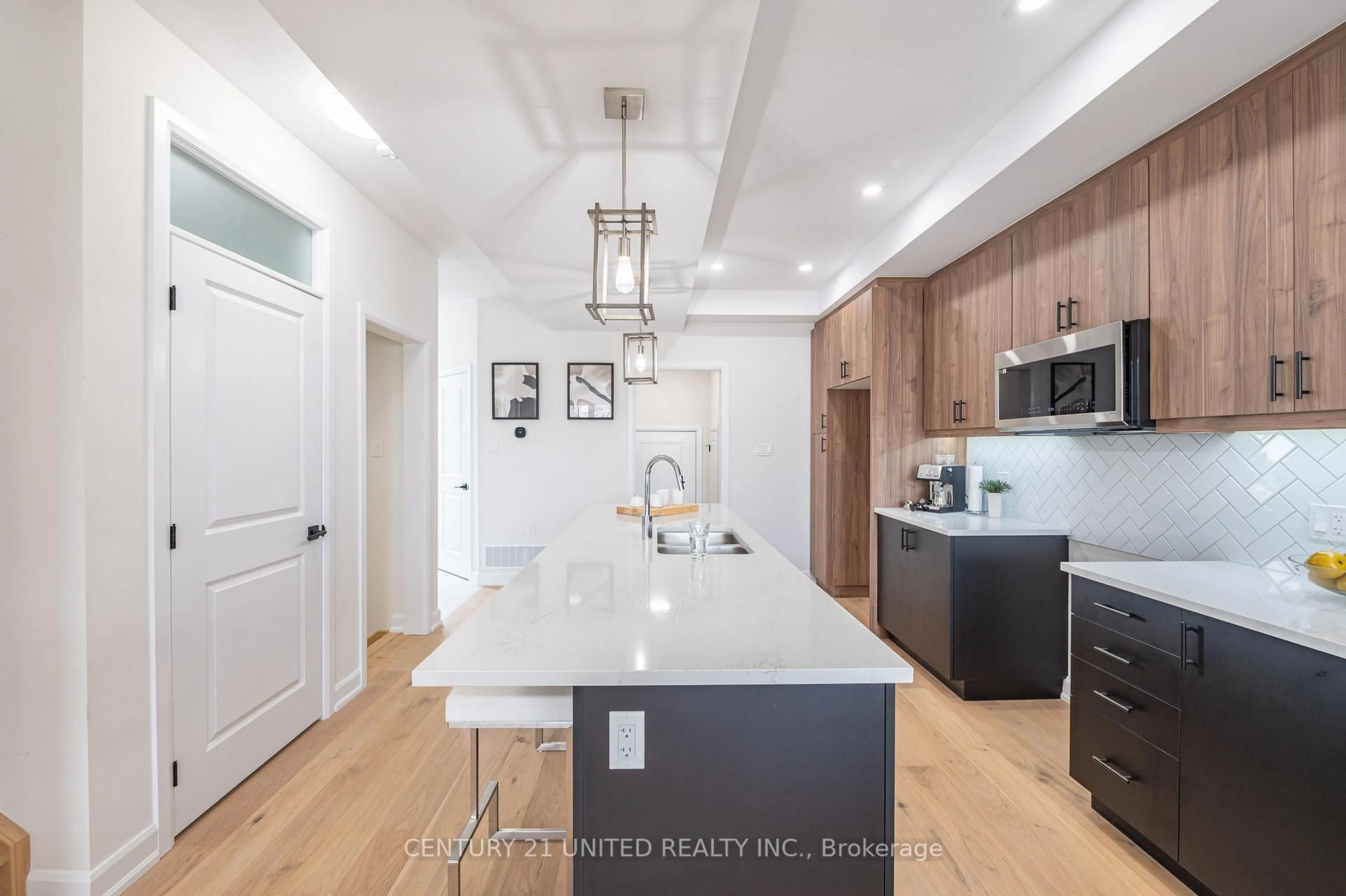 Open concept kitchen, ceramic/tile floor for 303 Mullighan Gdns, Peterborough Ontario K0K 0G3