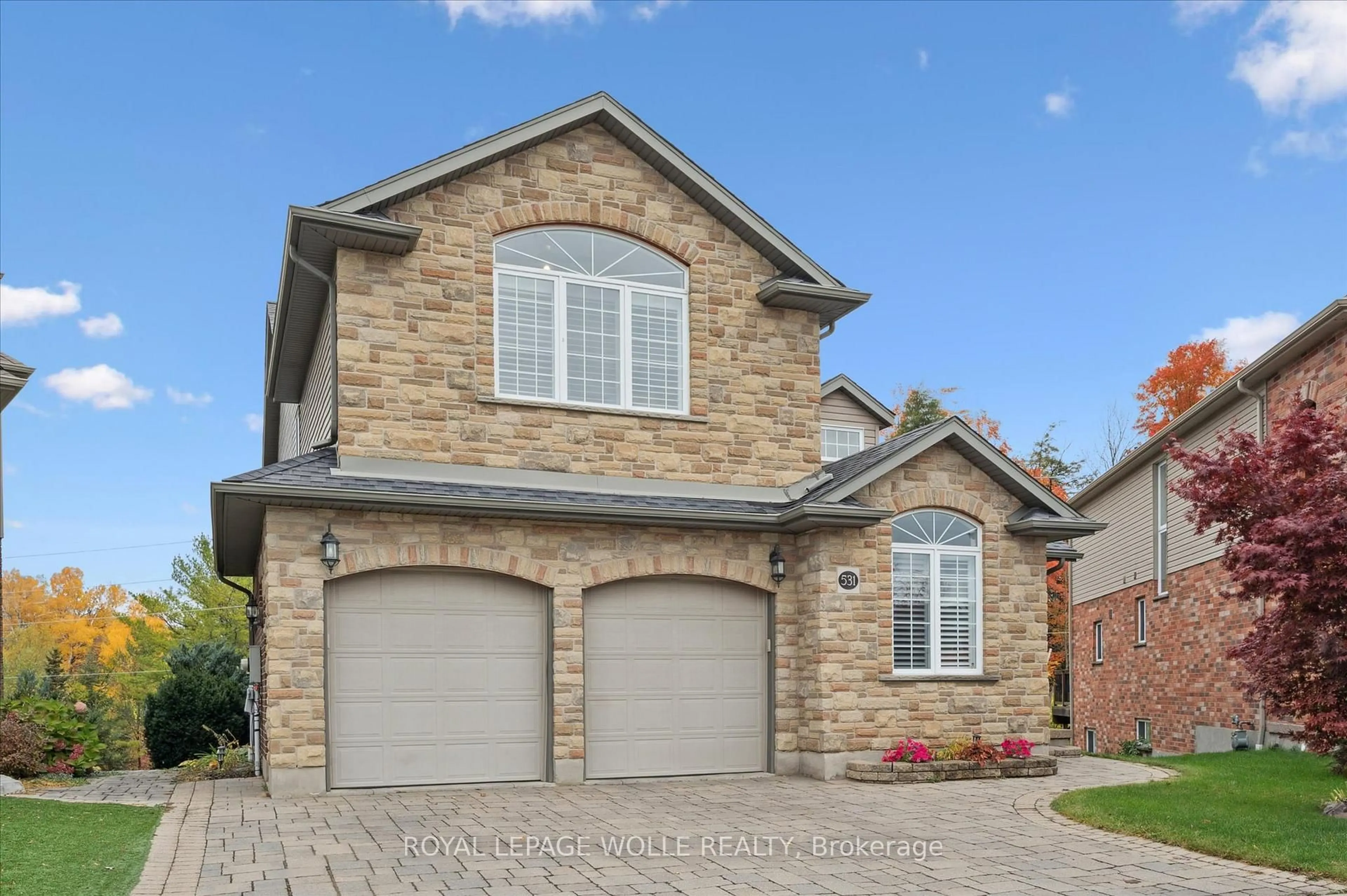 Home with brick exterior material, street for 531 Wood Nettle Way, Waterloo Ontario N2V 2X9