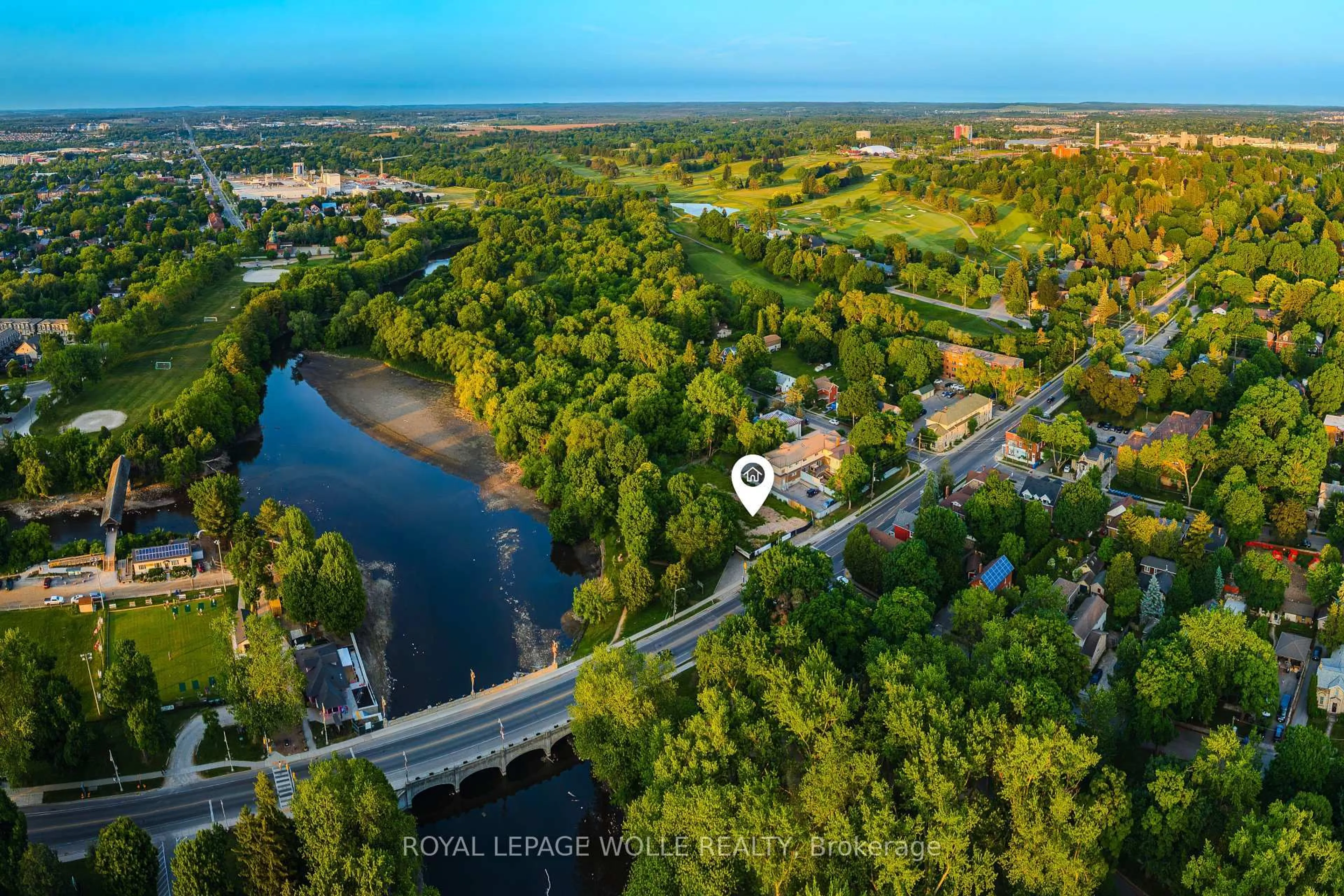 A pic from outside/outdoor area/front of a property/back of a property/a pic from drone, water/lake/river/ocean view for 180 Gordon St #4, Guelph Ontario N1G 1X1