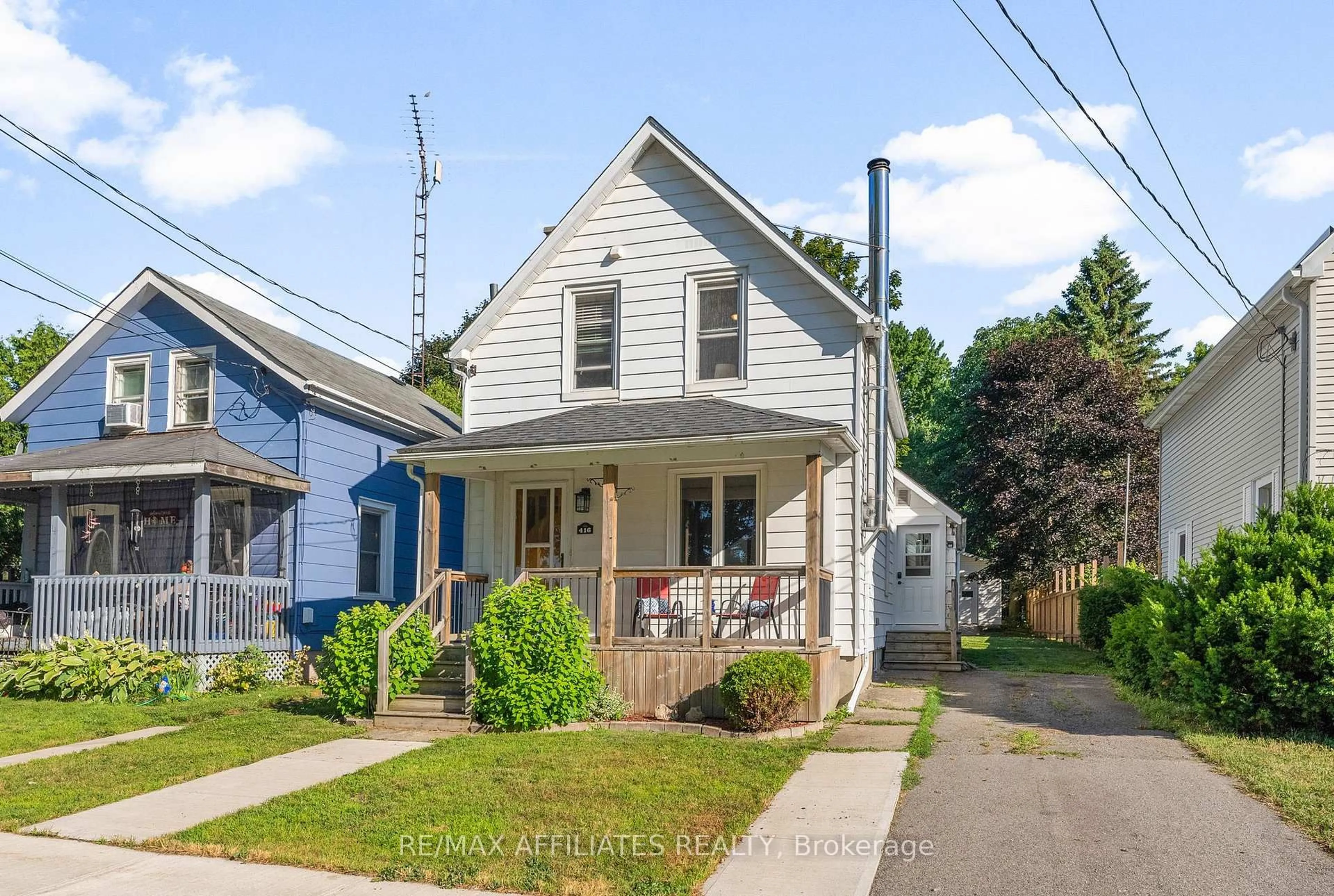 Home with vinyl exterior material, street for 416 Dibble St, Prescott Ontario K0E 1T0