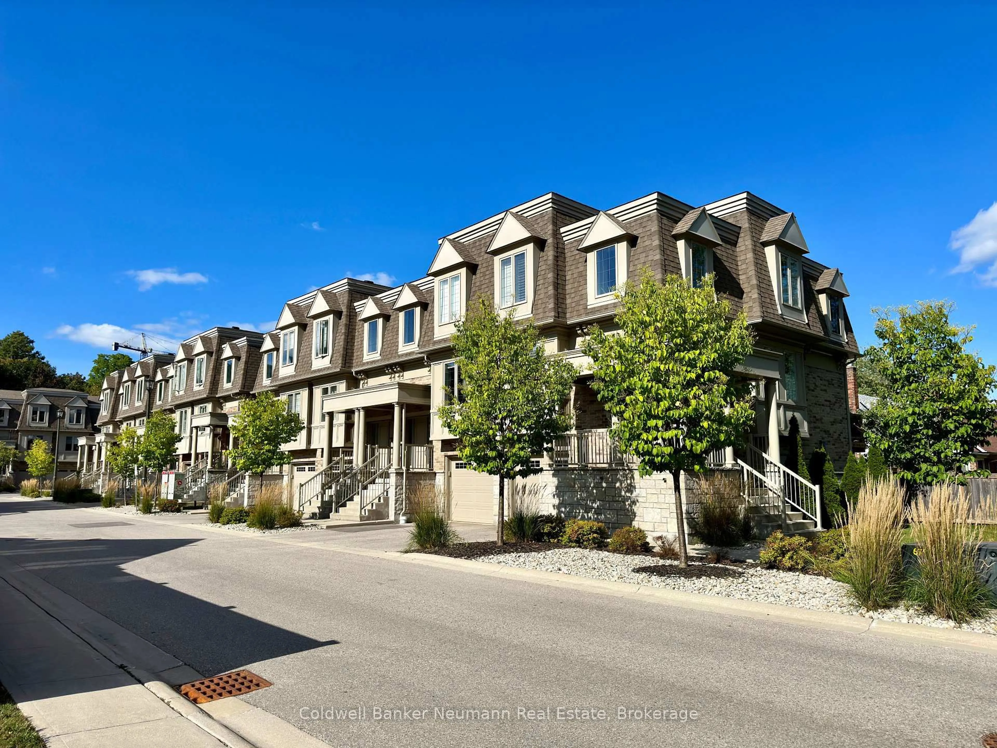 A pic from outside/outdoor area/front of a property/back of a property/a pic from drone, street for 72 York Rd #4, Guelph Ontario N1E 0M3