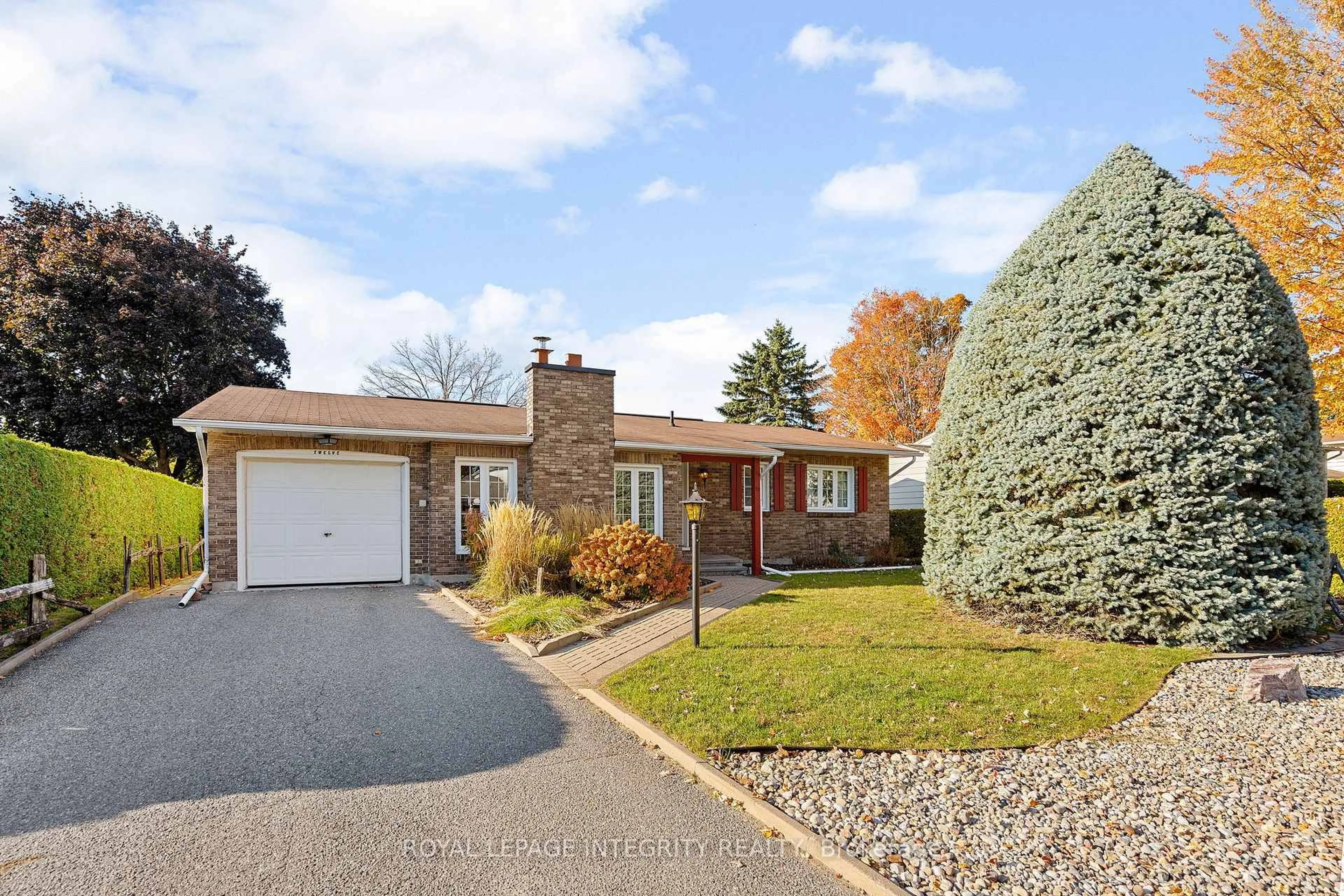 Home with brick exterior material, street for 12 Wynford Ave, Ottawa Ontario K2G 3Z3