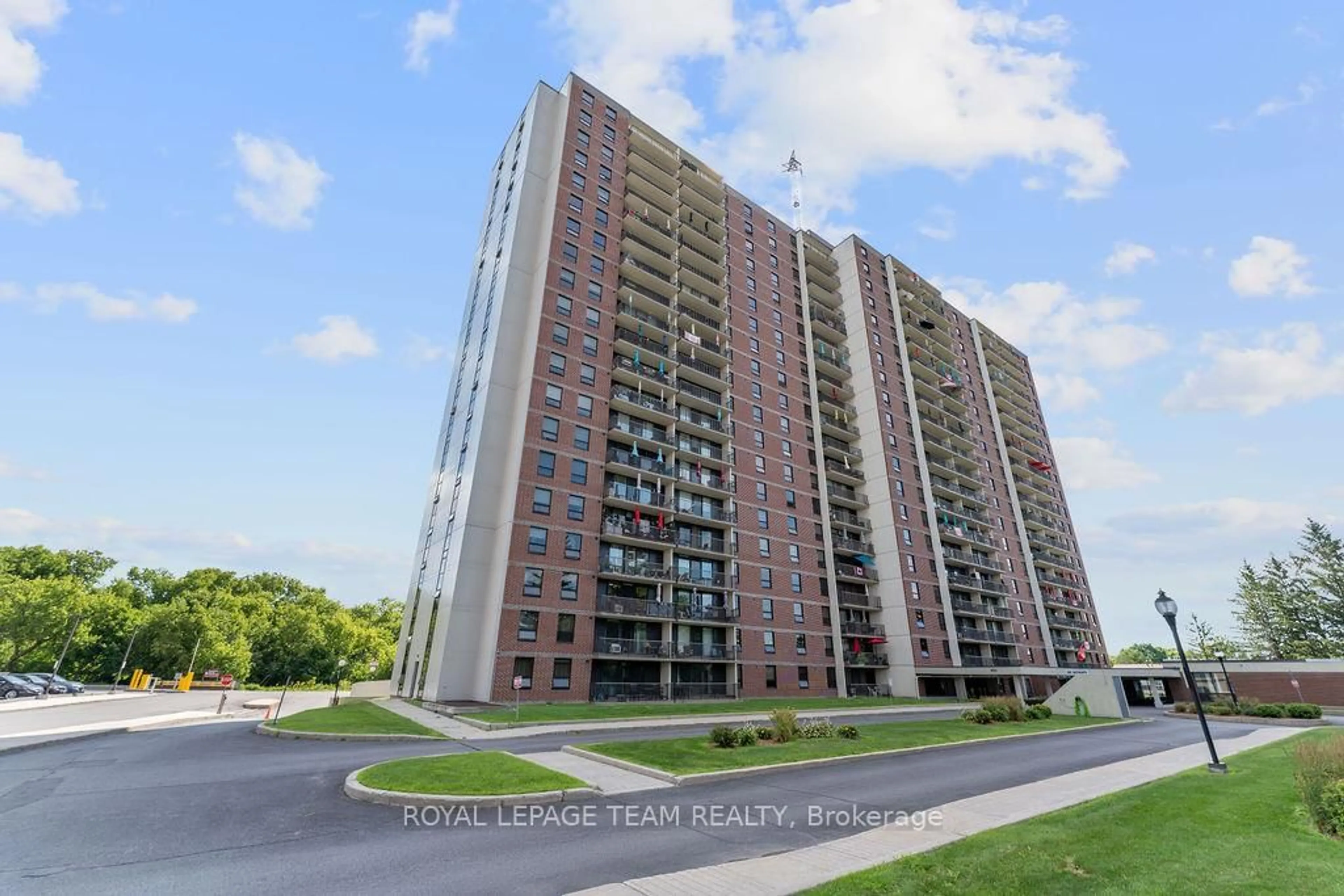 A pic from outside/outdoor area/front of a property/back of a property/a pic from drone, unknown for 665 Bathgate Dr #302, Ottawa Ontario K1K 3Y4
