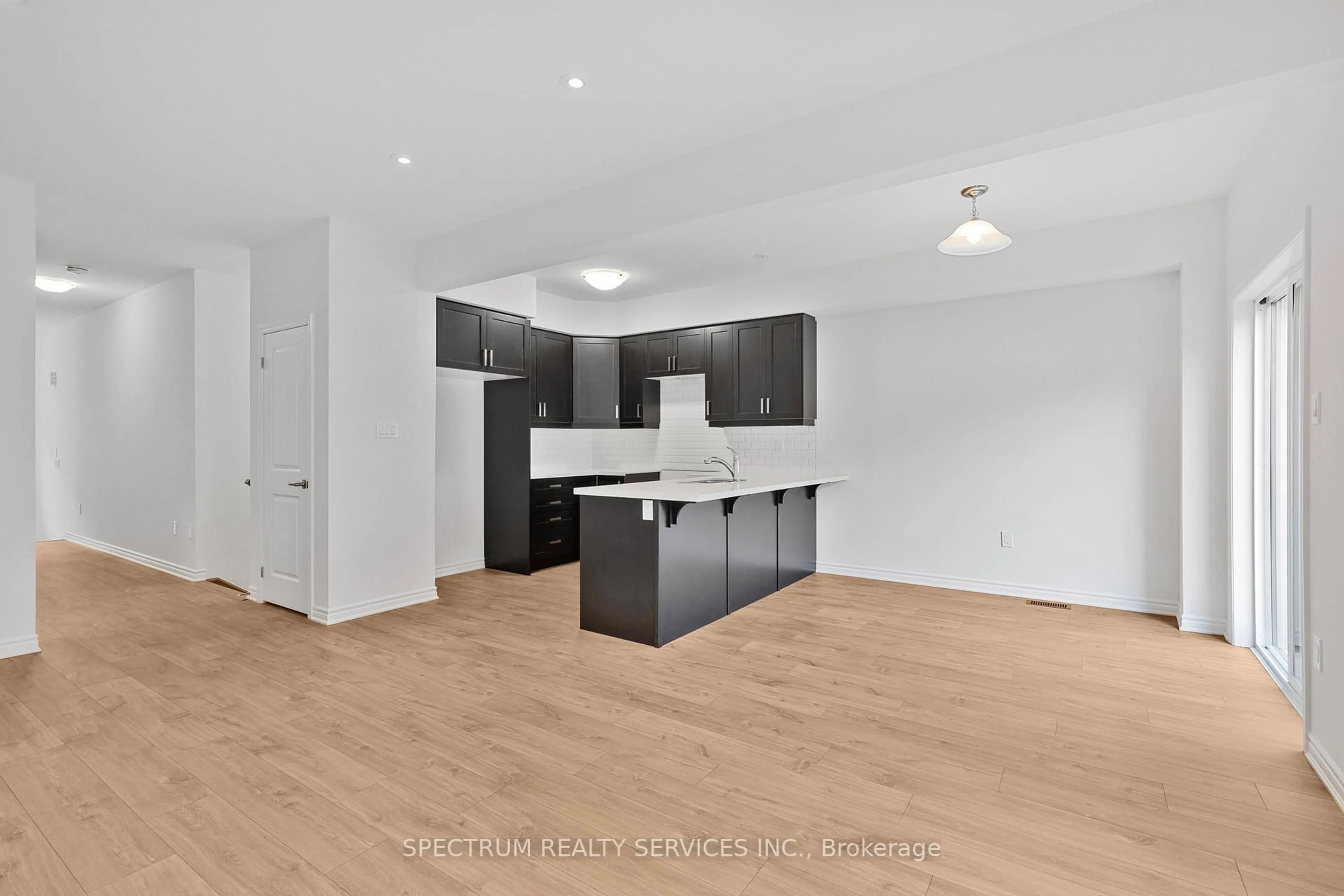 Open concept kitchen, wood/laminate floor for 305 Garner Rd #66, Hamilton Ontario L9G 3K9