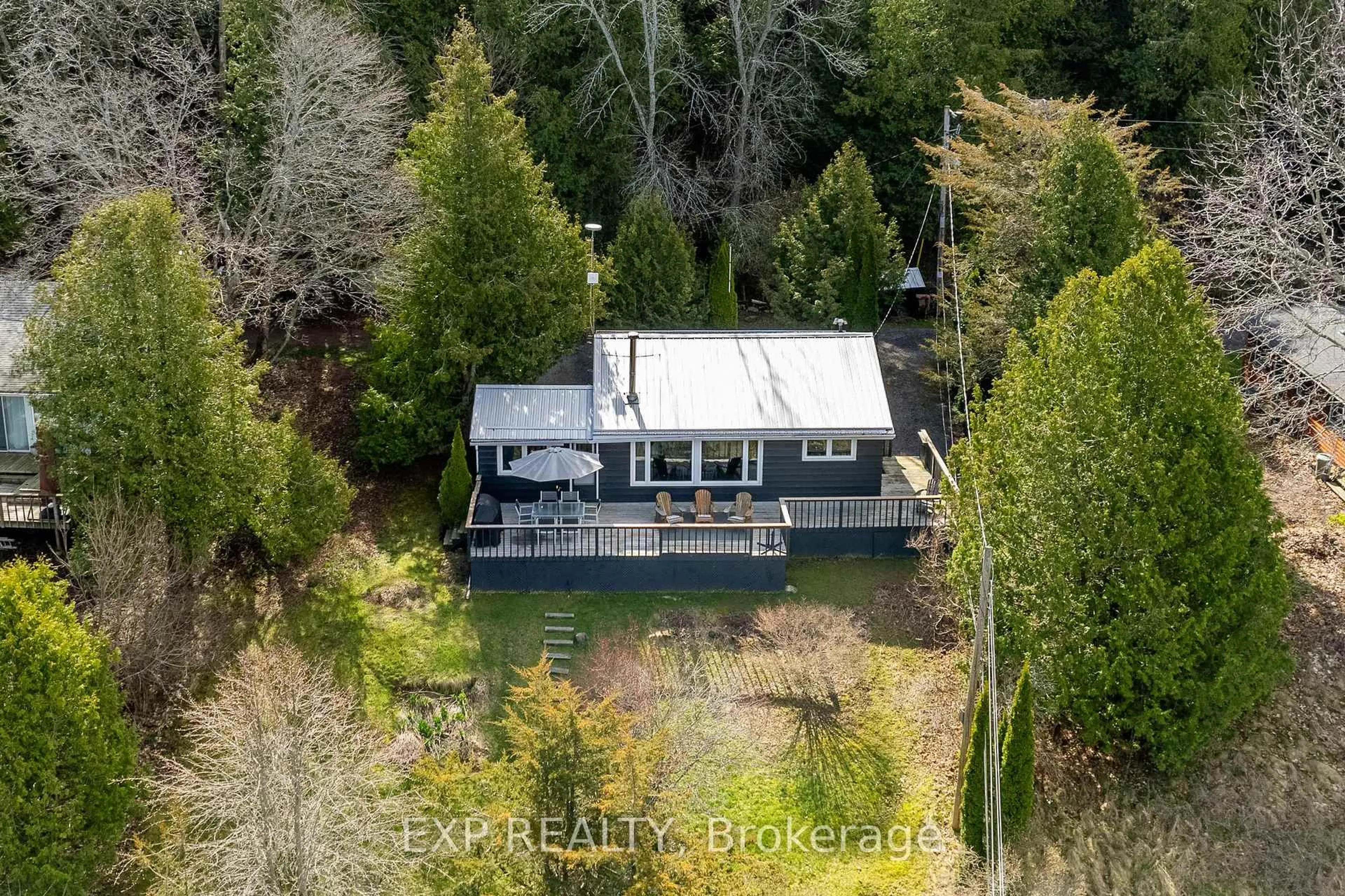 A pic from outside/outdoor area/front of a property/back of a property/a pic from drone, water/lake/river/ocean view for 23 Pc Lane, Prince Edward County Ontario K0K 2T0