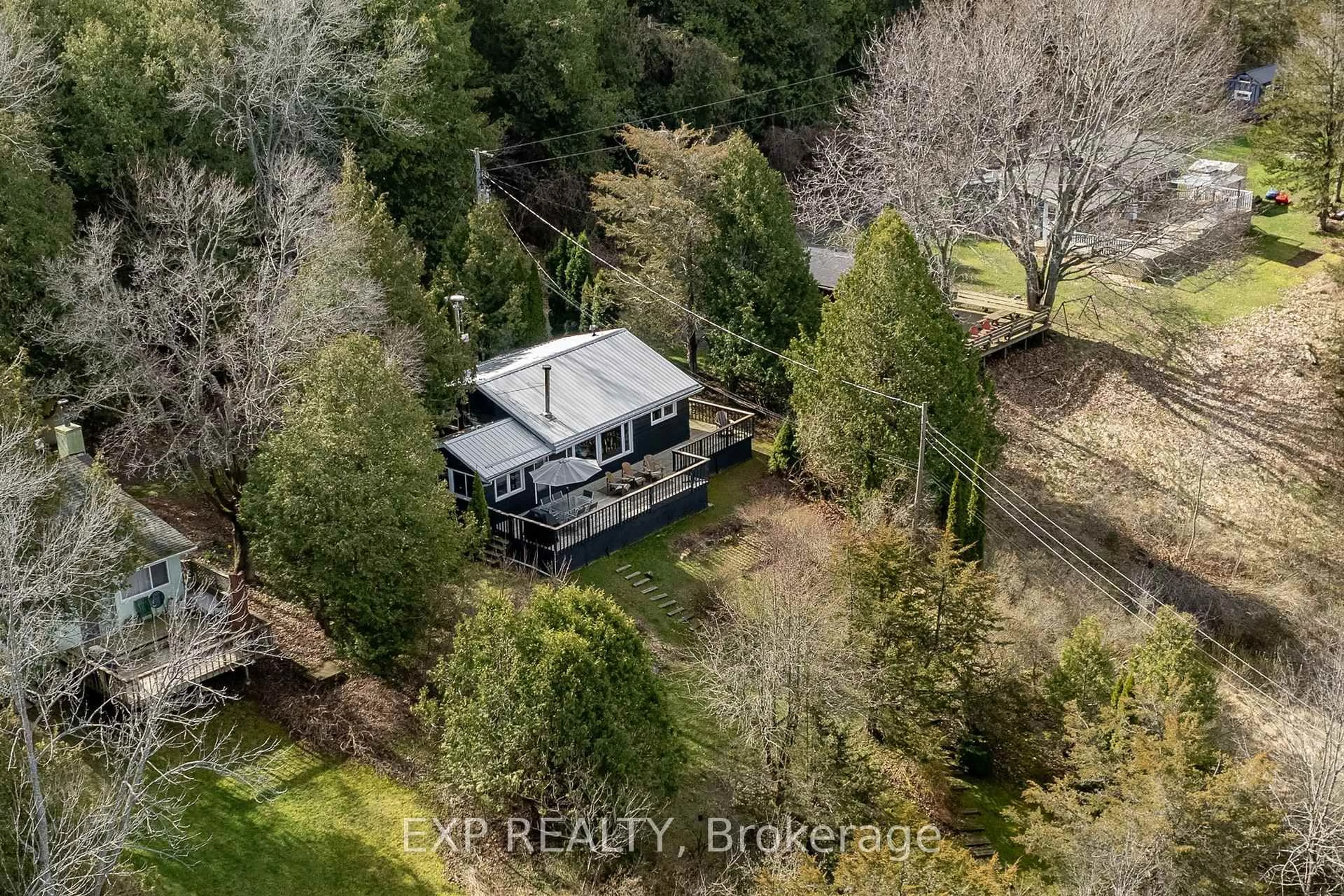 A pic from outside/outdoor area/front of a property/back of a property/a pic from drone, unknown for 23 PC Lane, Prince Edward County Ontario K0K 2T0