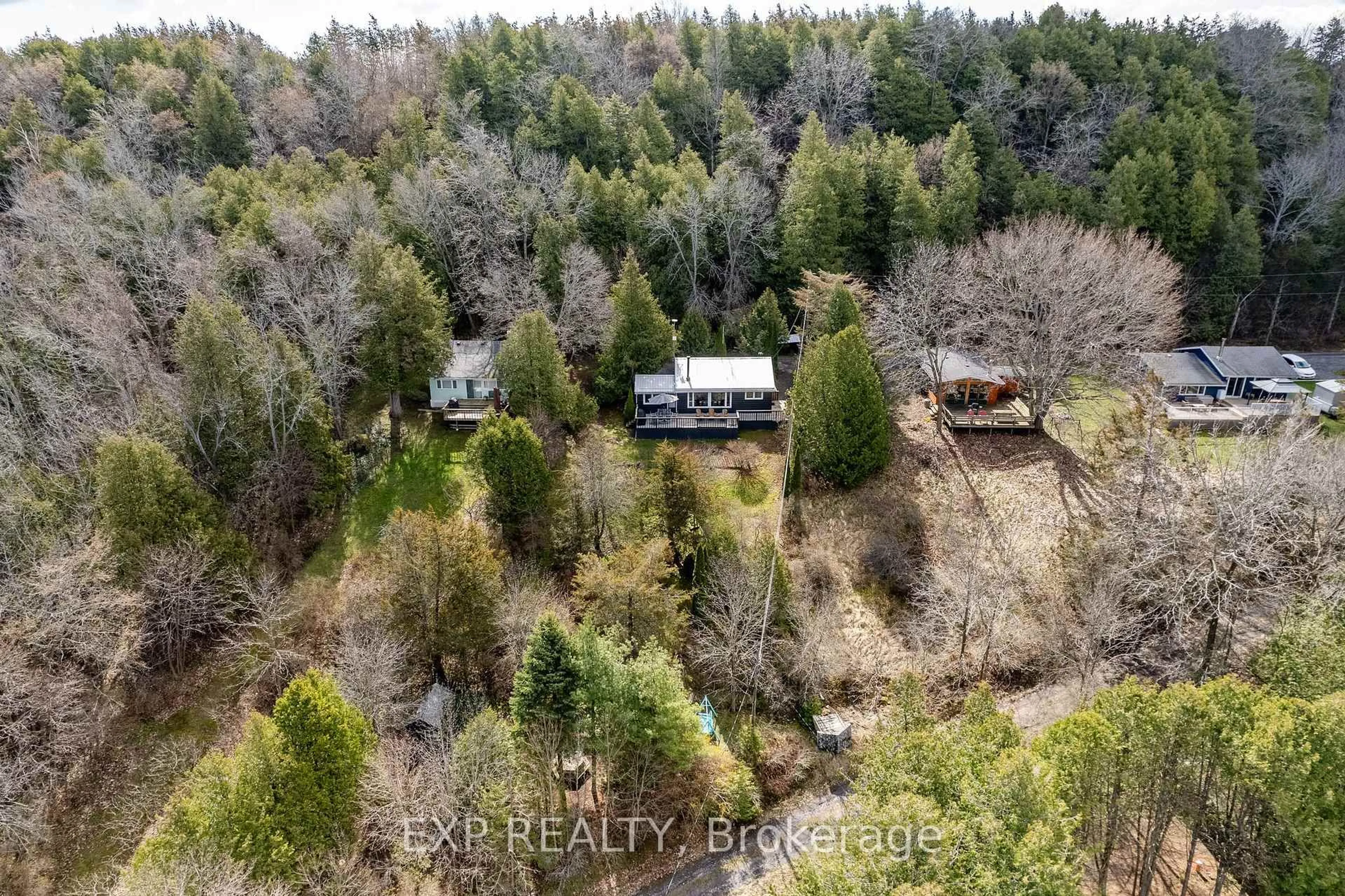 A pic from outside/outdoor area/front of a property/back of a property/a pic from drone, forest/trees view for 23 PC Lane, Prince Edward County Ontario K0K 2T0