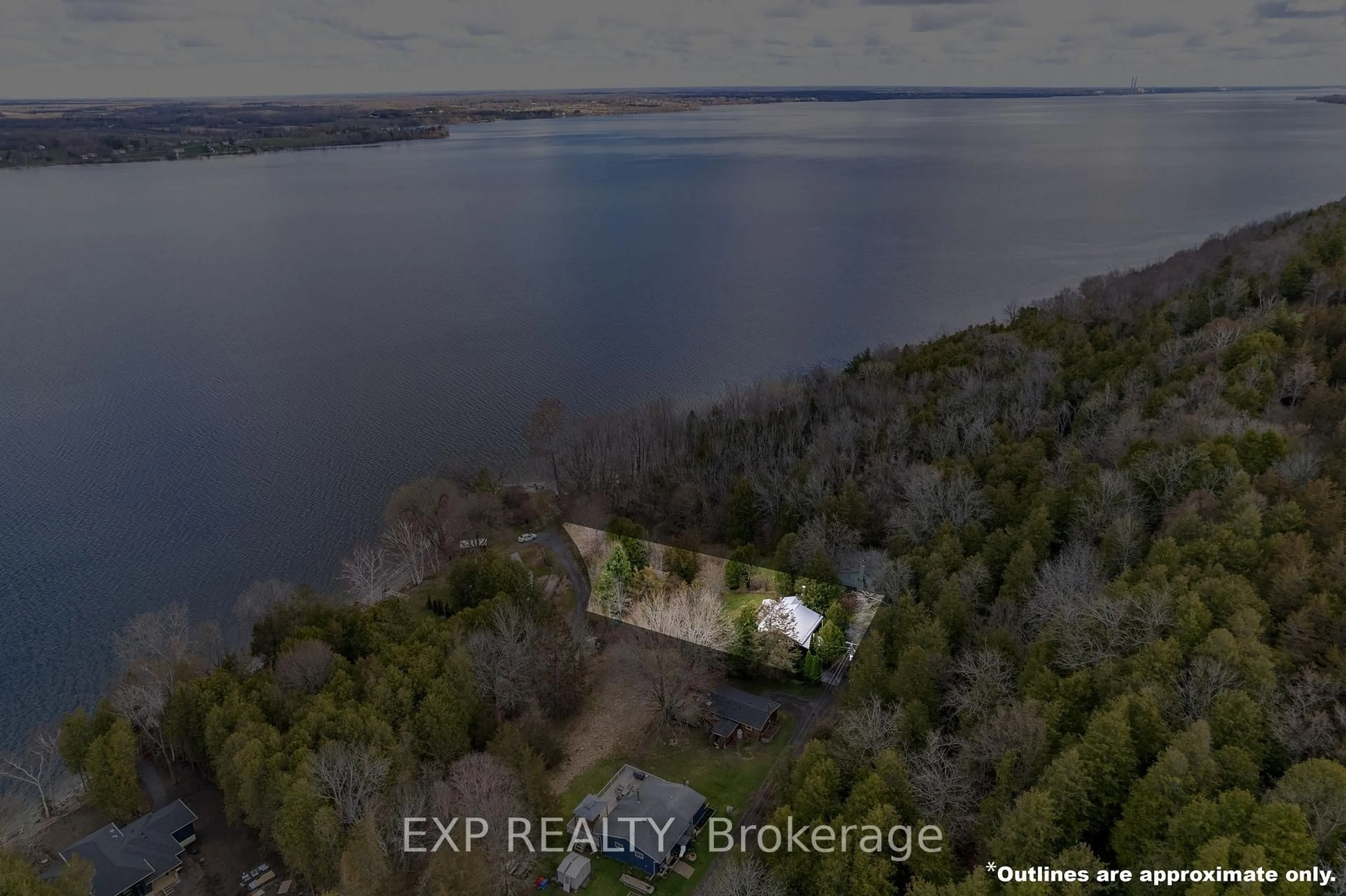 A pic from outside/outdoor area/front of a property/back of a property/a pic from drone, water/lake/river/ocean view for 23 PC Lane, Prince Edward County Ontario K0K 2T0