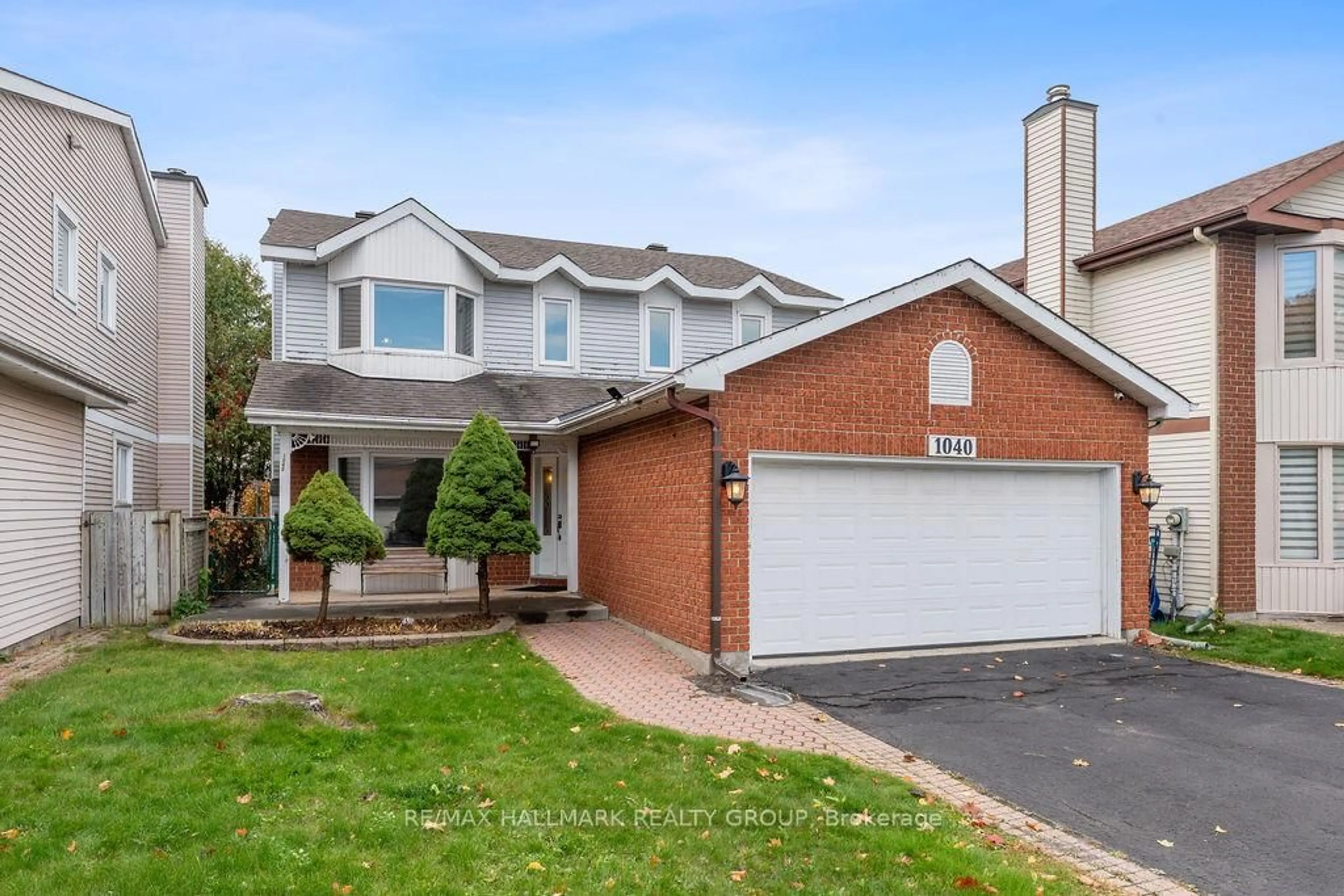 Home with brick exterior material, street for 1040 Karsh Dr, Ottawa Ontario K1G 4M9