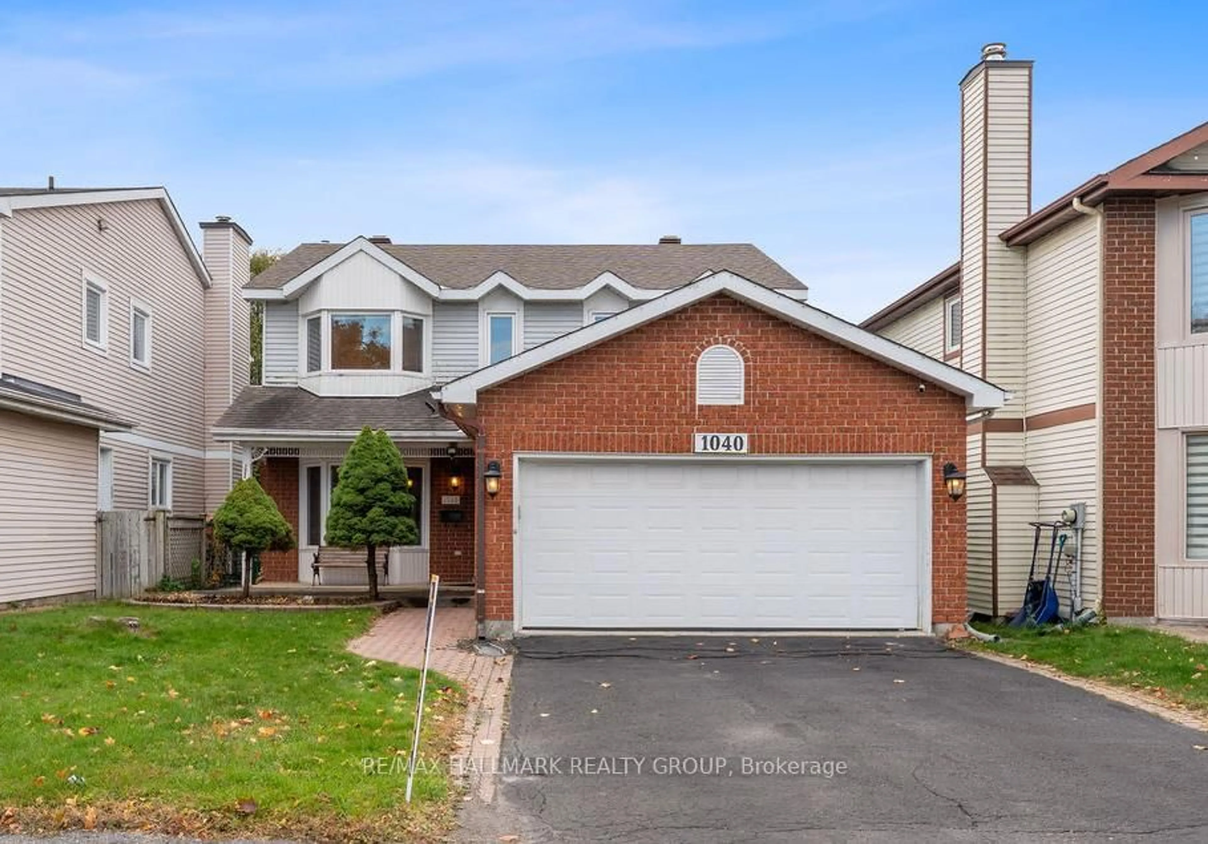 Home with brick exterior material, street for 1040 Karsh Dr, Ottawa Ontario K1G 4M9
