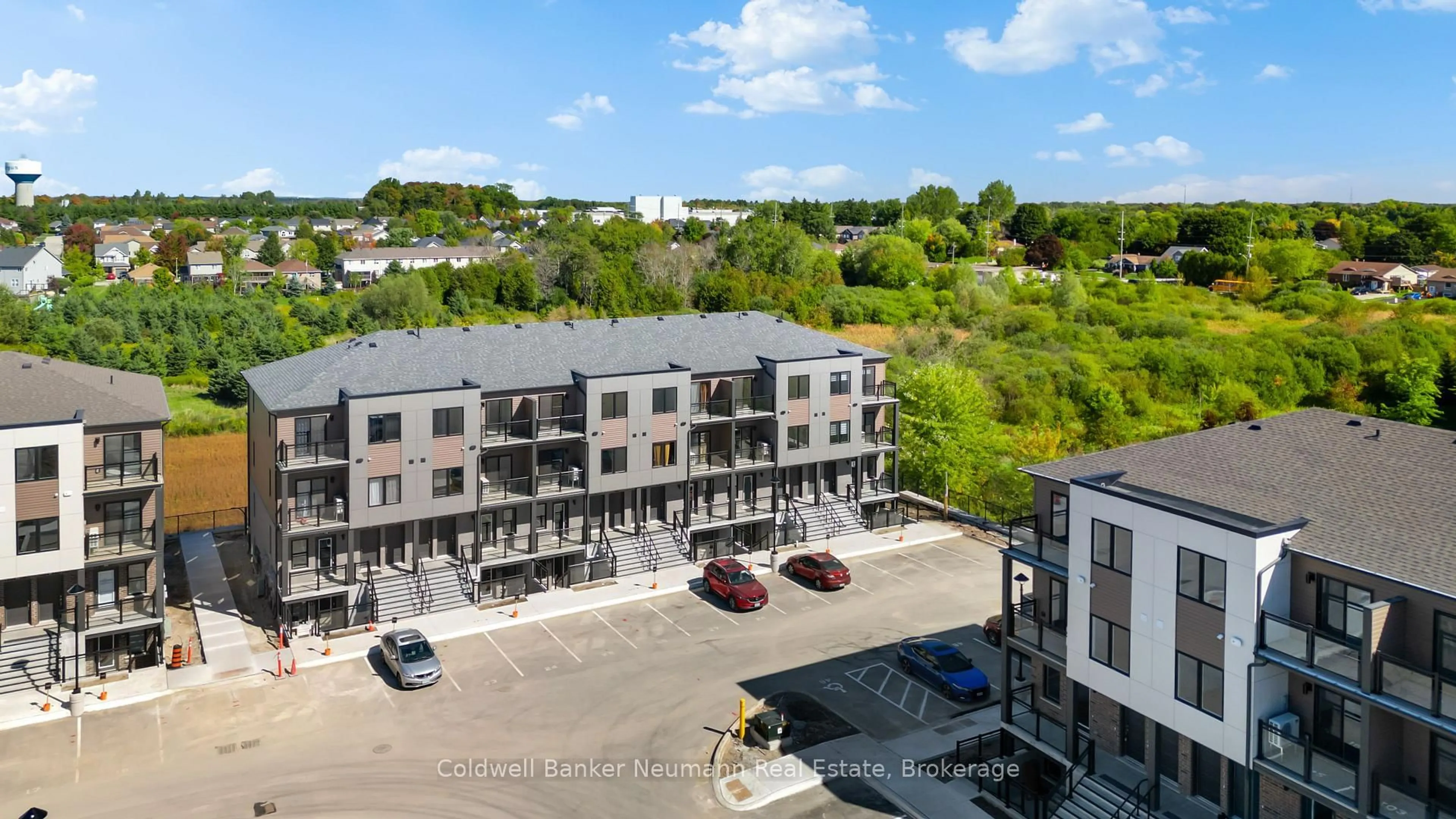 A pic from outside/outdoor area/front of a property/back of a property/a pic from drone, city buildings view from balcony for 940 David St #43, Centre Wellington Ontario N1M 0L7