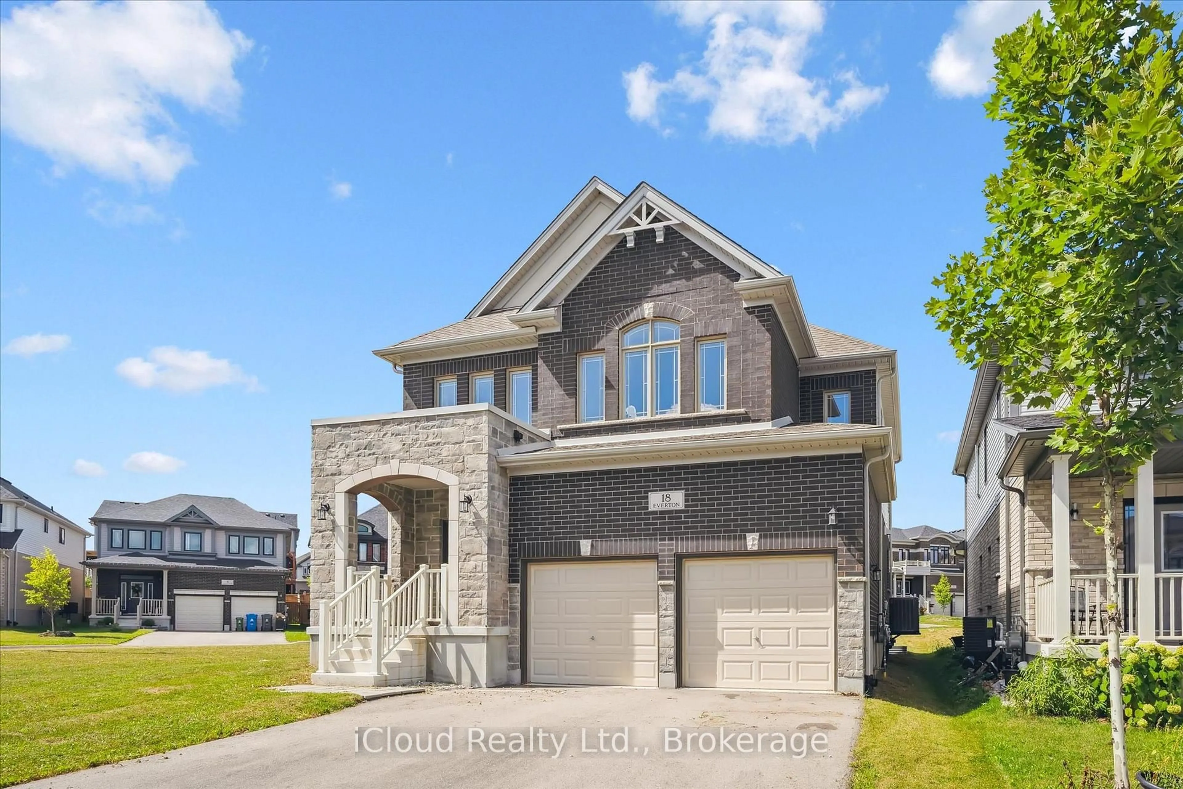 Home with brick exterior material, street for 18 Everton Dr, Guelph Ontario N1E 0R9