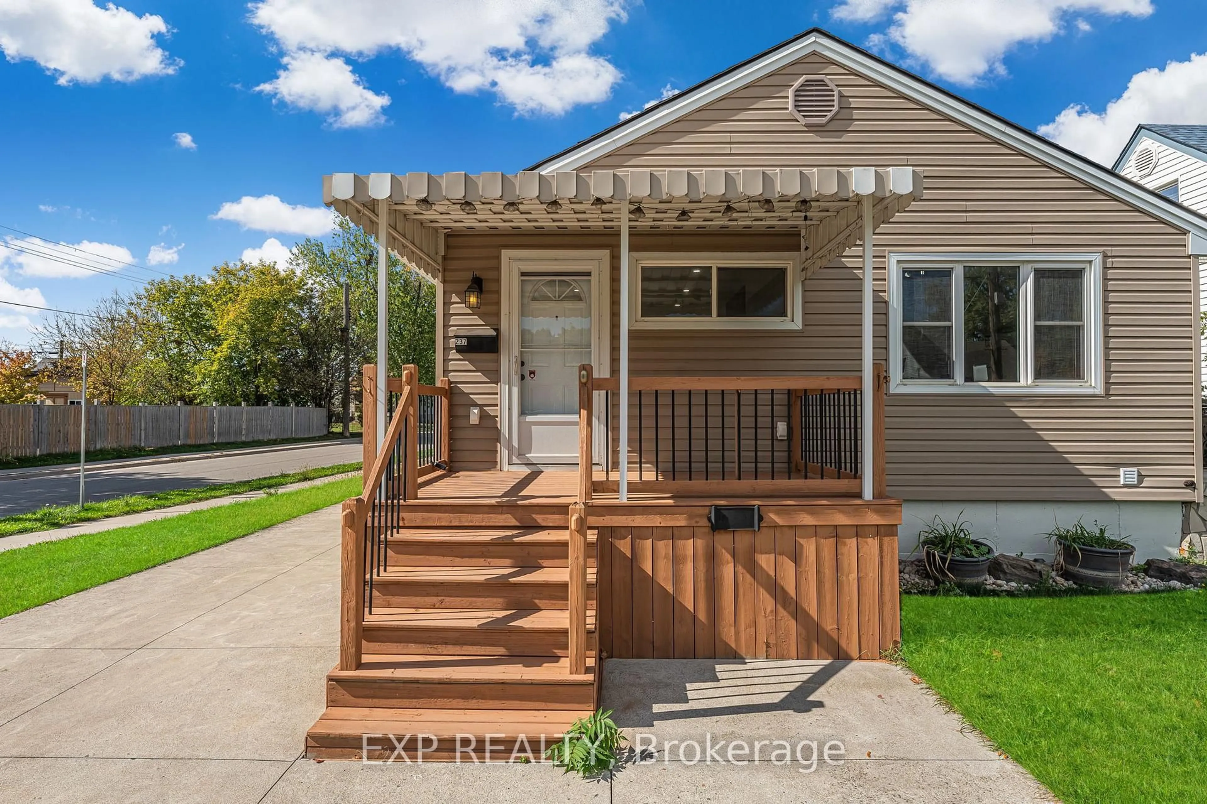 Home with vinyl exterior material, street for 237 Adair Ave, Hamilton Ontario L8H 6B3