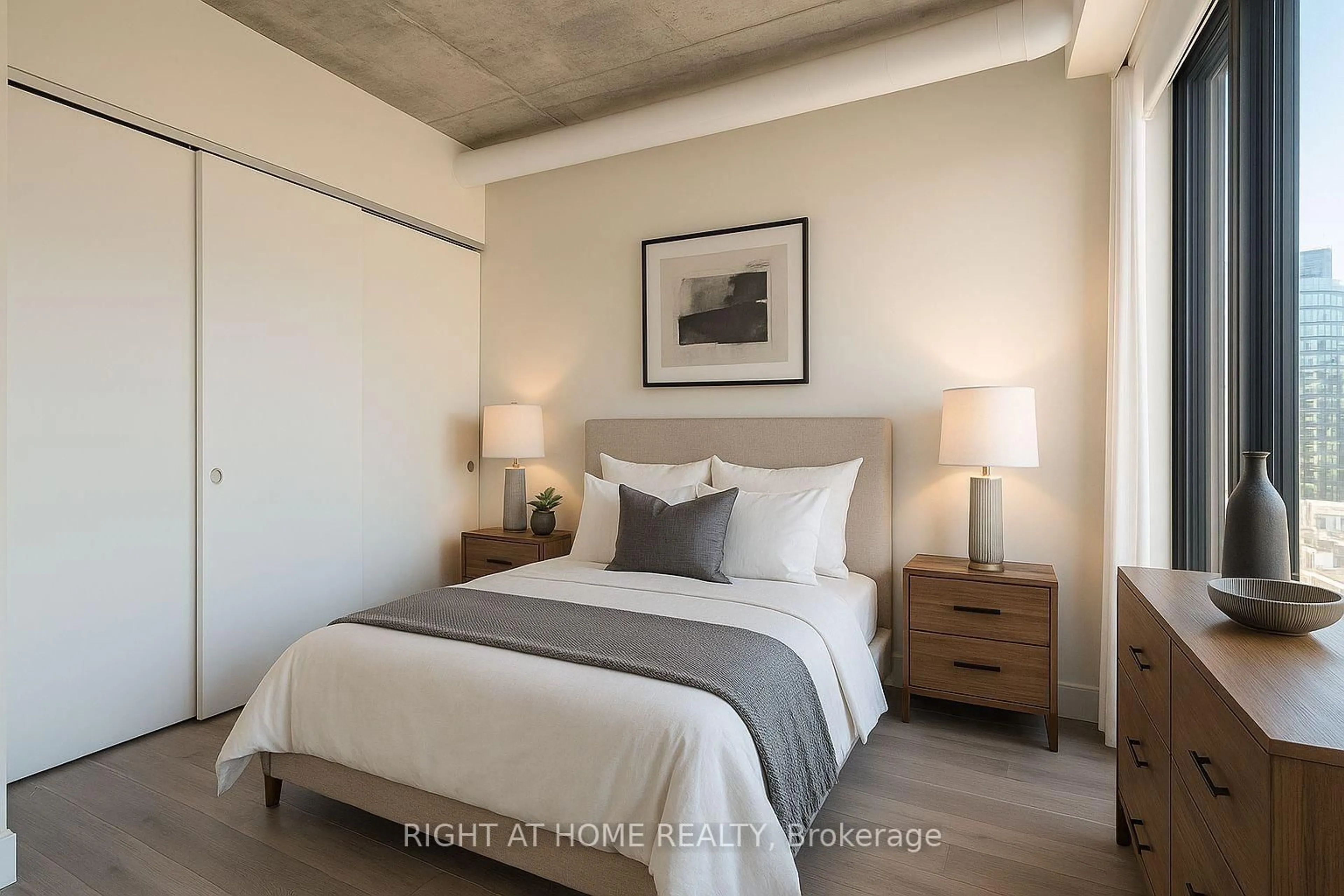 Bedroom with bed, cement floor for 10 James St #603, Ottawa Ontario K2P 1Y5