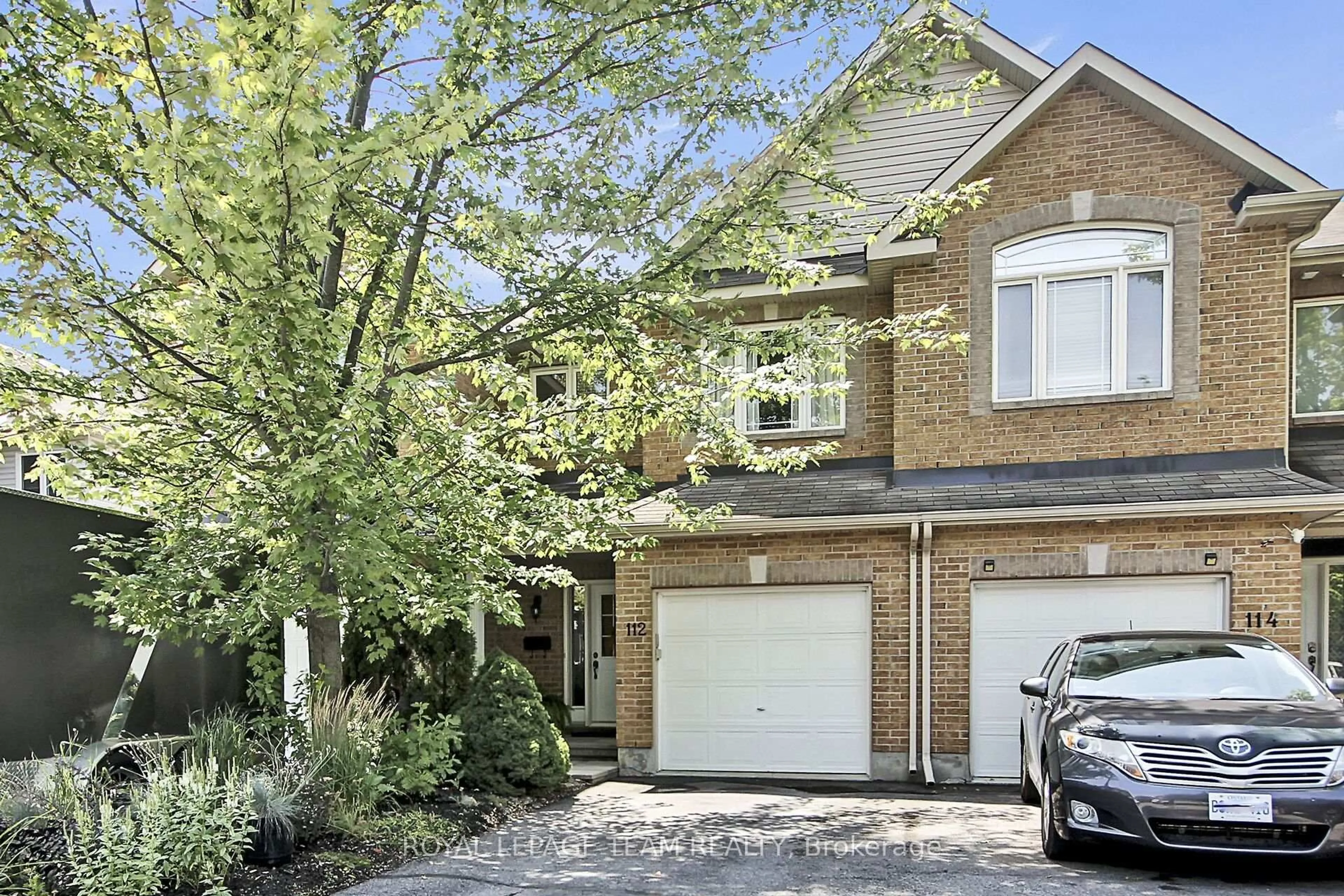 Home with brick exterior material, street for 112 Talltree Cres, Ottawa Ontario K2S 0A9