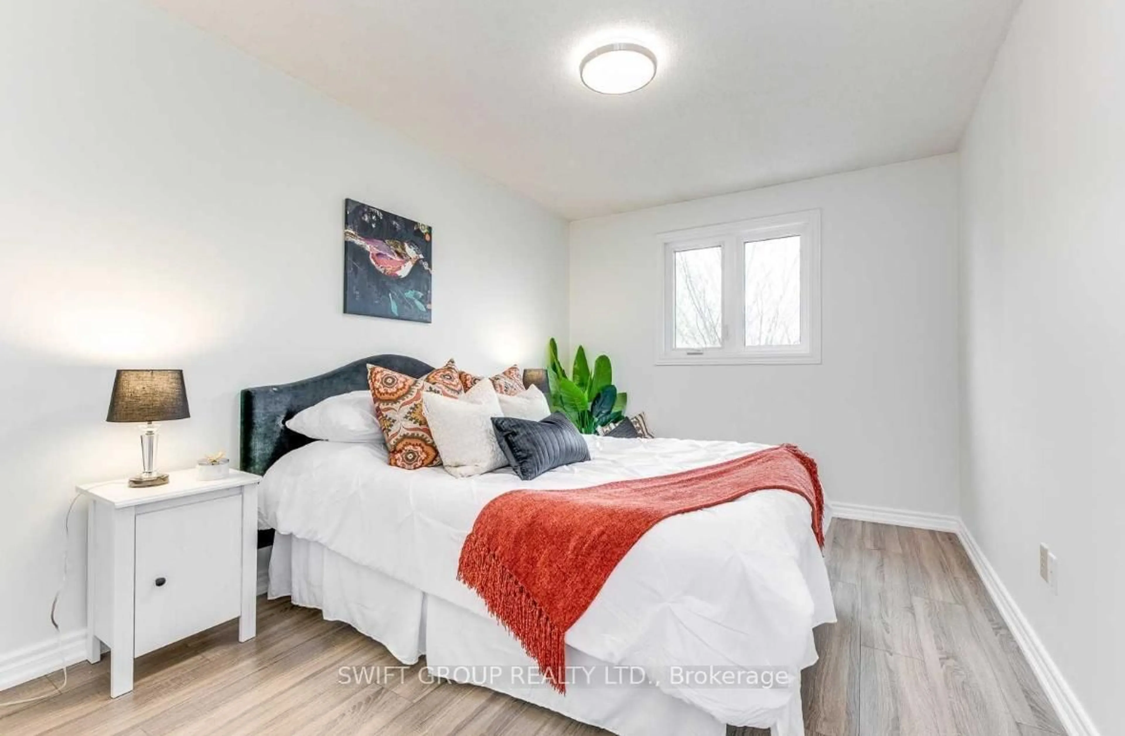 Bedroom with bed, wood/laminate floor for 3 Perthshire Crt, Hamilton Ontario L9K 1R6