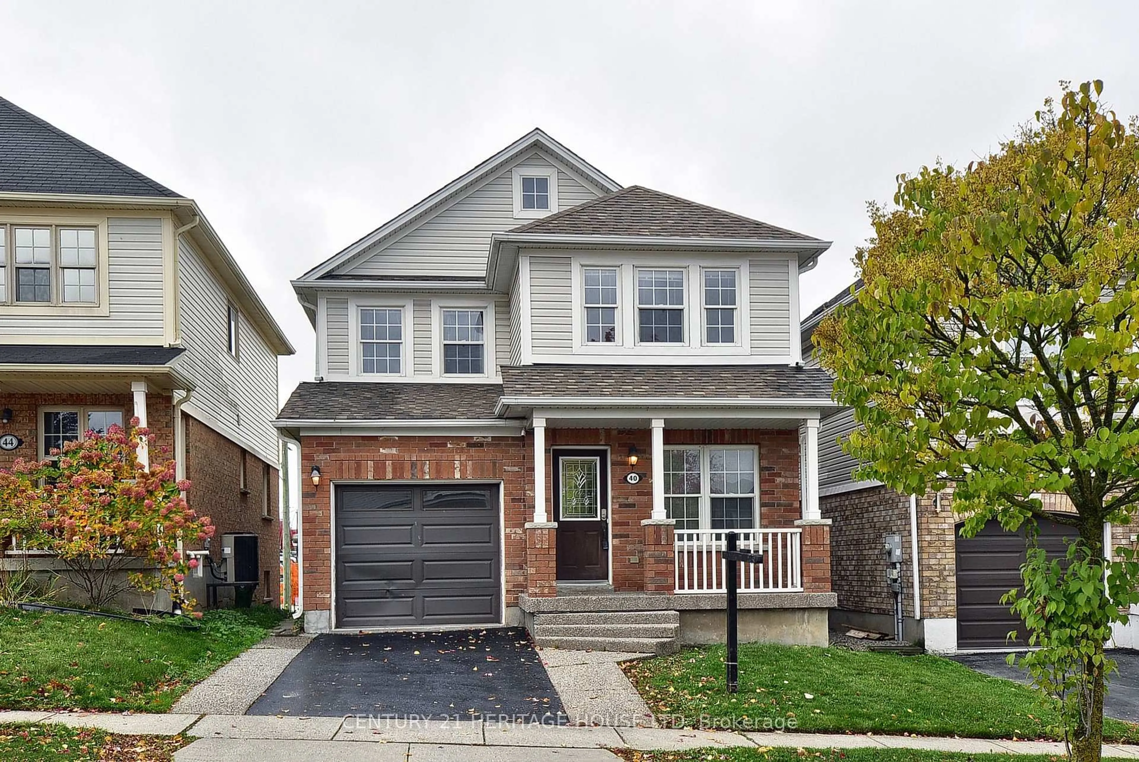 Home with brick exterior material, street for 40 Swift Cres, Cambridge Ontario N1P 1J9