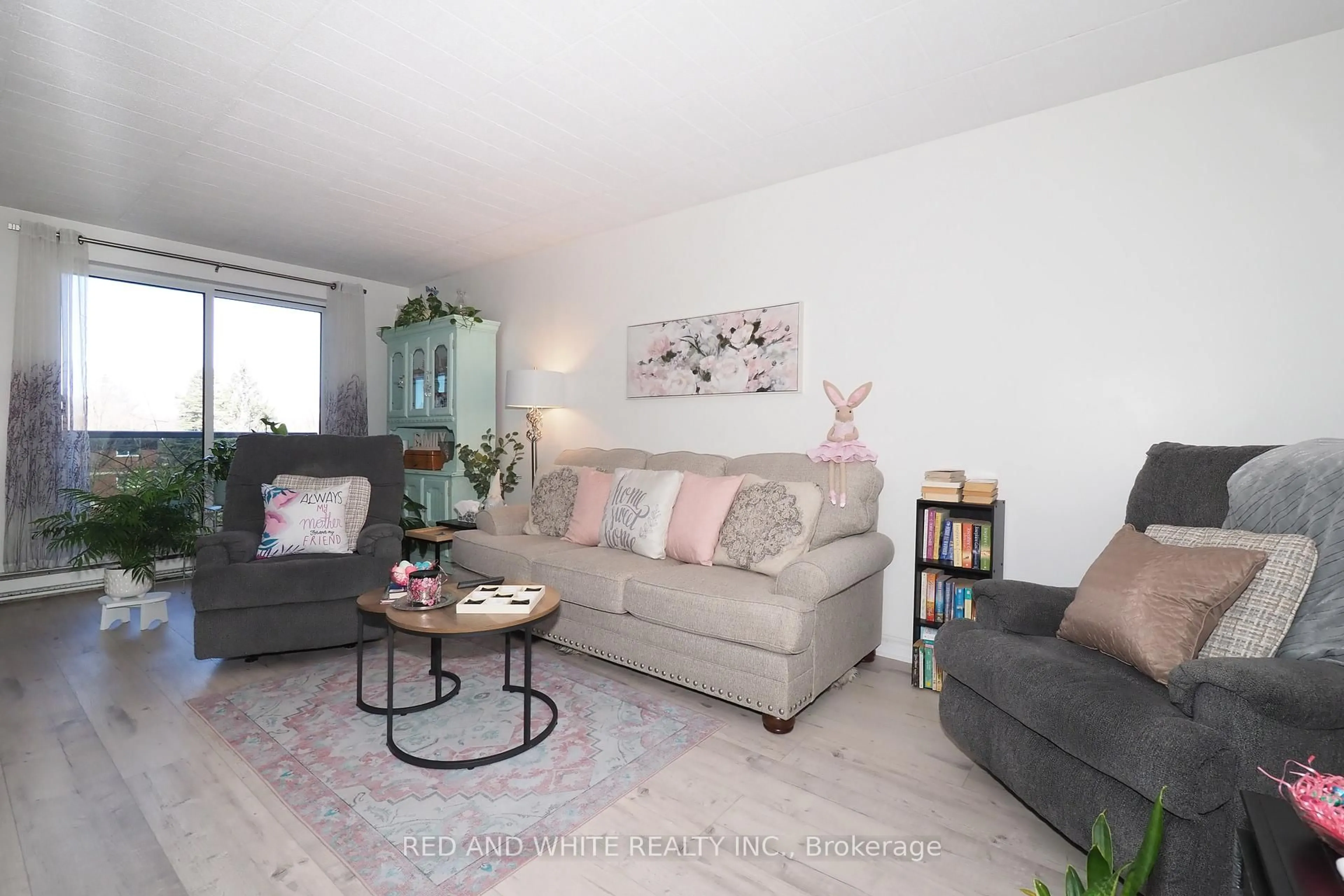 Living room with furniture, wood/laminate floor for 29 West Ave #403, Kitchener Ontario N2M 5E4