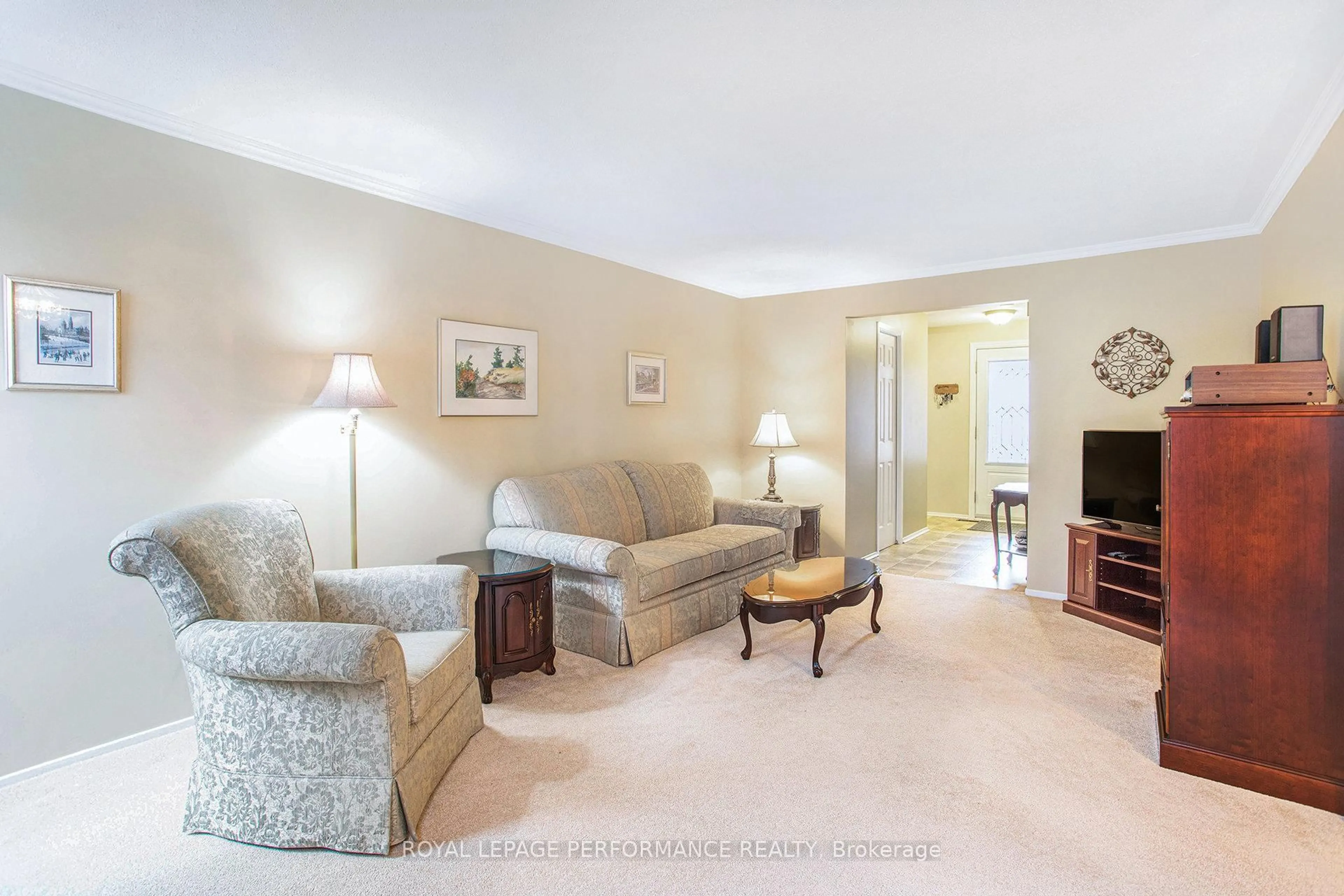 Living room with furniture, carpet floor for 6097 Forestglen Cres, Orleans Ontario K1C 5N9