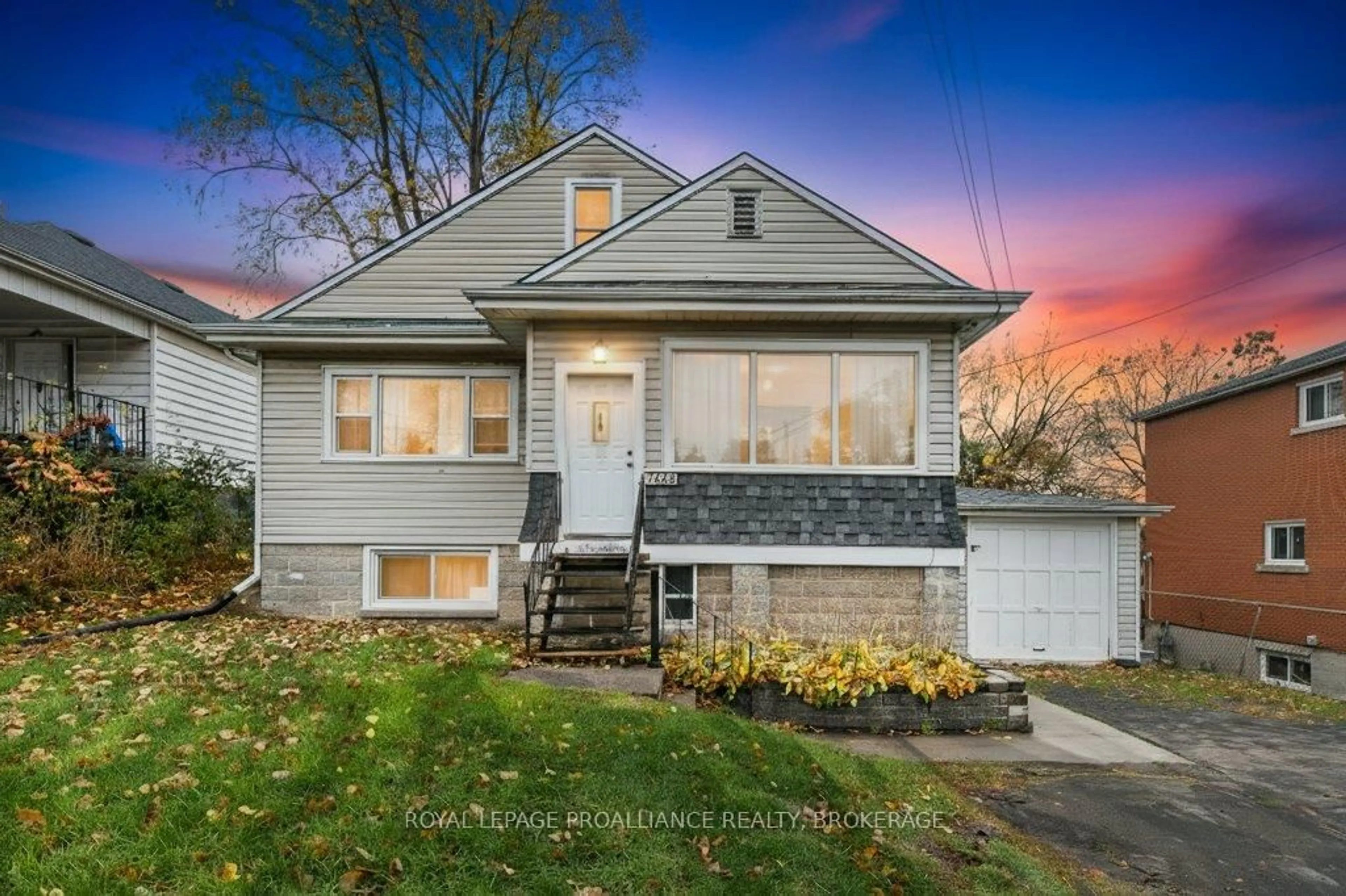 Home with vinyl exterior material, street for 1348 Princess St, Kingston Ontario K7M 3E2