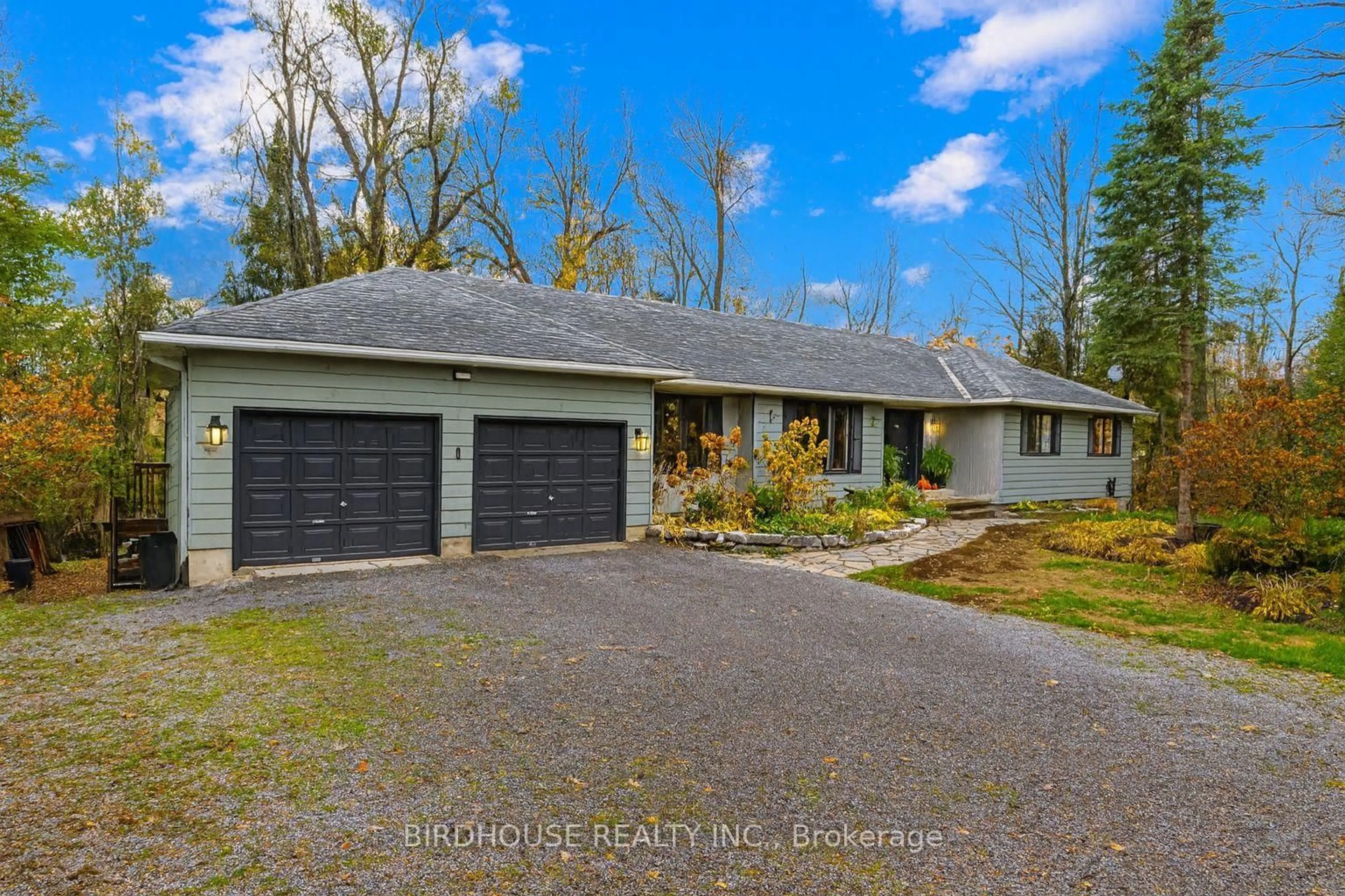 A pic from outside/outdoor area/front of a property/back of a property/a pic from drone, water/lake/river/ocean view for 102 Edwina Dr, Trent Lakes Ontario K0M 1A0