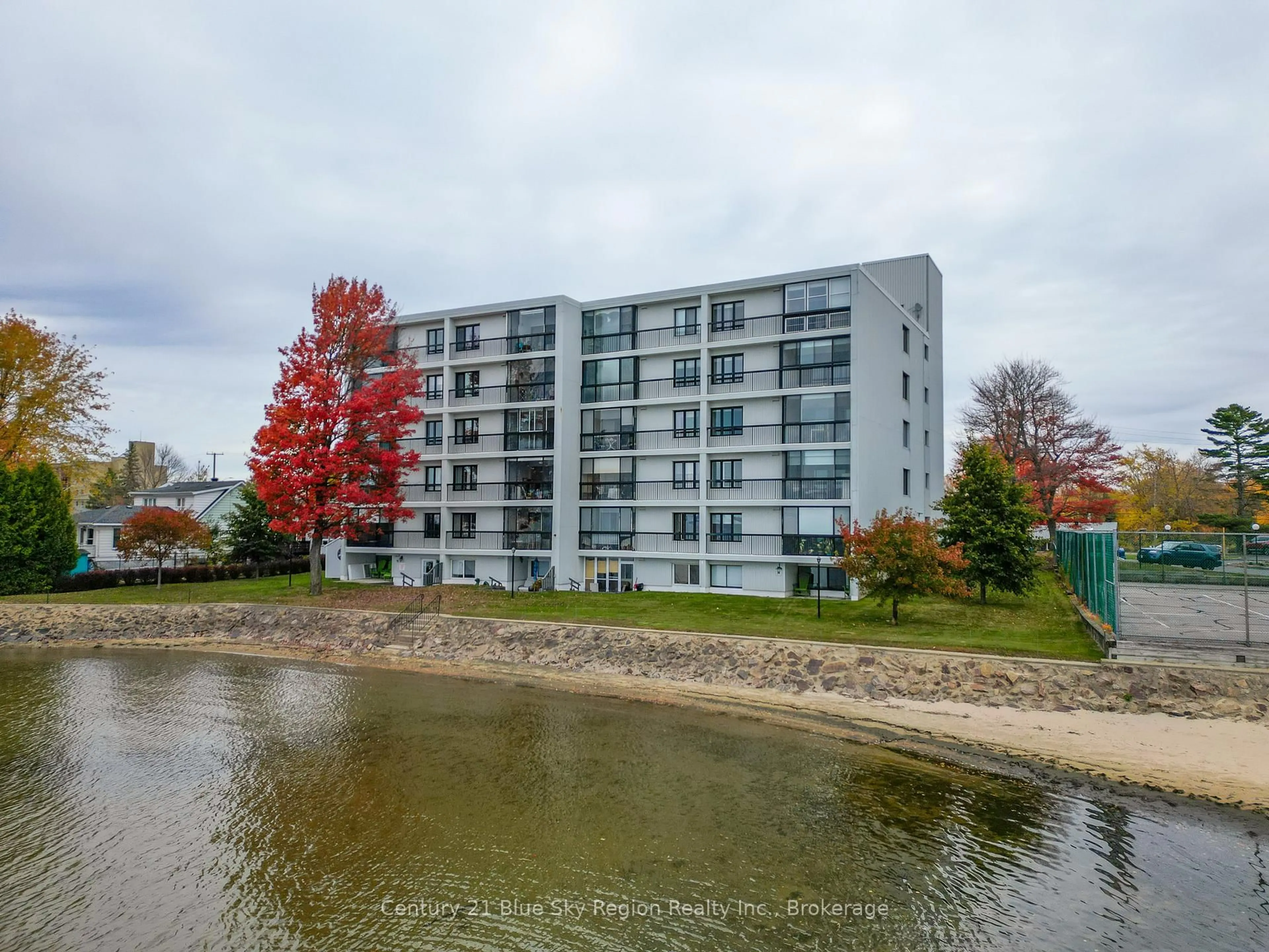 A pic from outside/outdoor area/front of a property/back of a property/a pic from drone, water/lake/river/ocean view for 425 William St #401, North Bay Ontario P1A 1X6