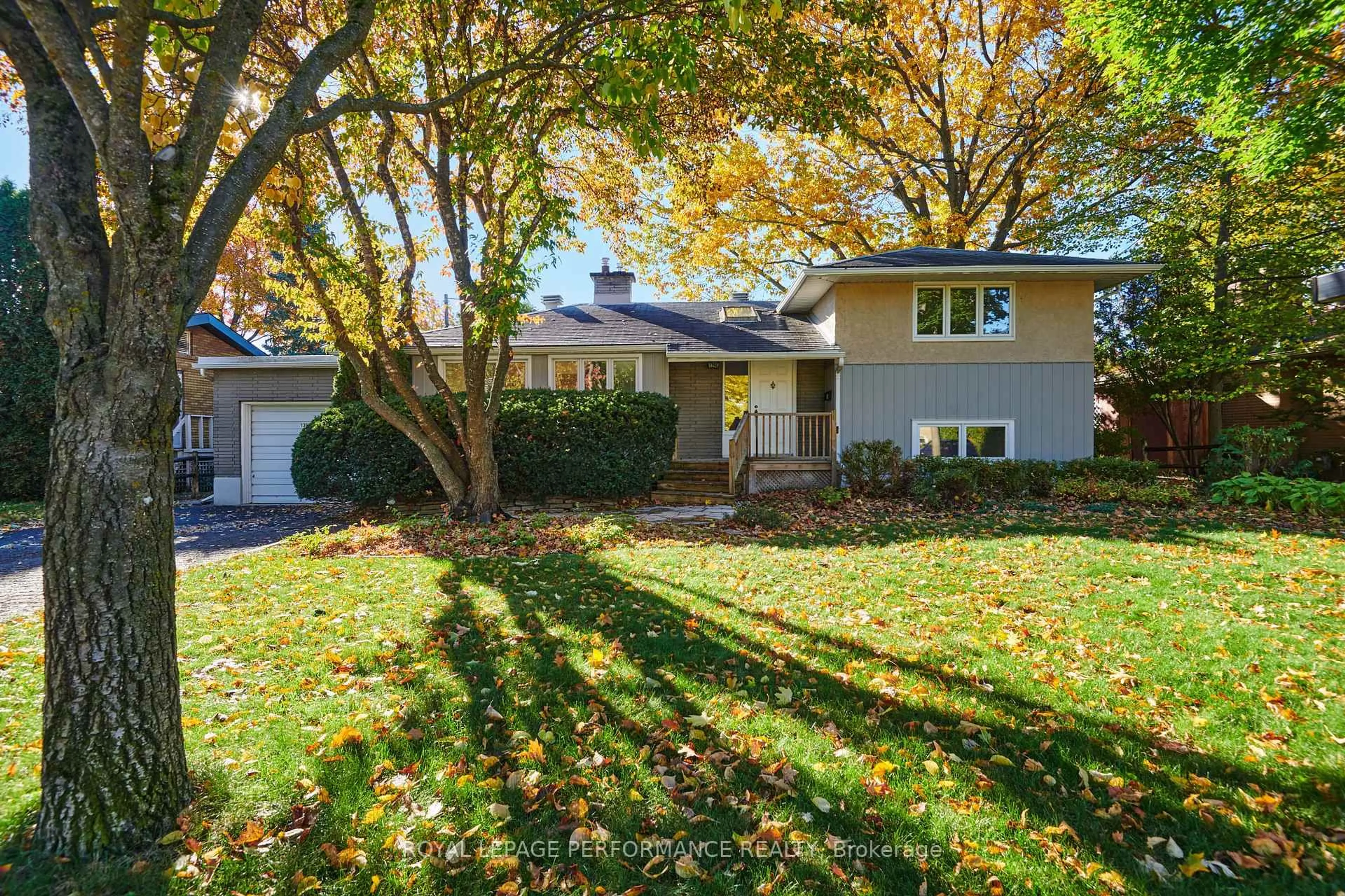 Home with vinyl exterior material, street for 1394 Wesmar Dr, Ottawa Ontario K1H 7T5