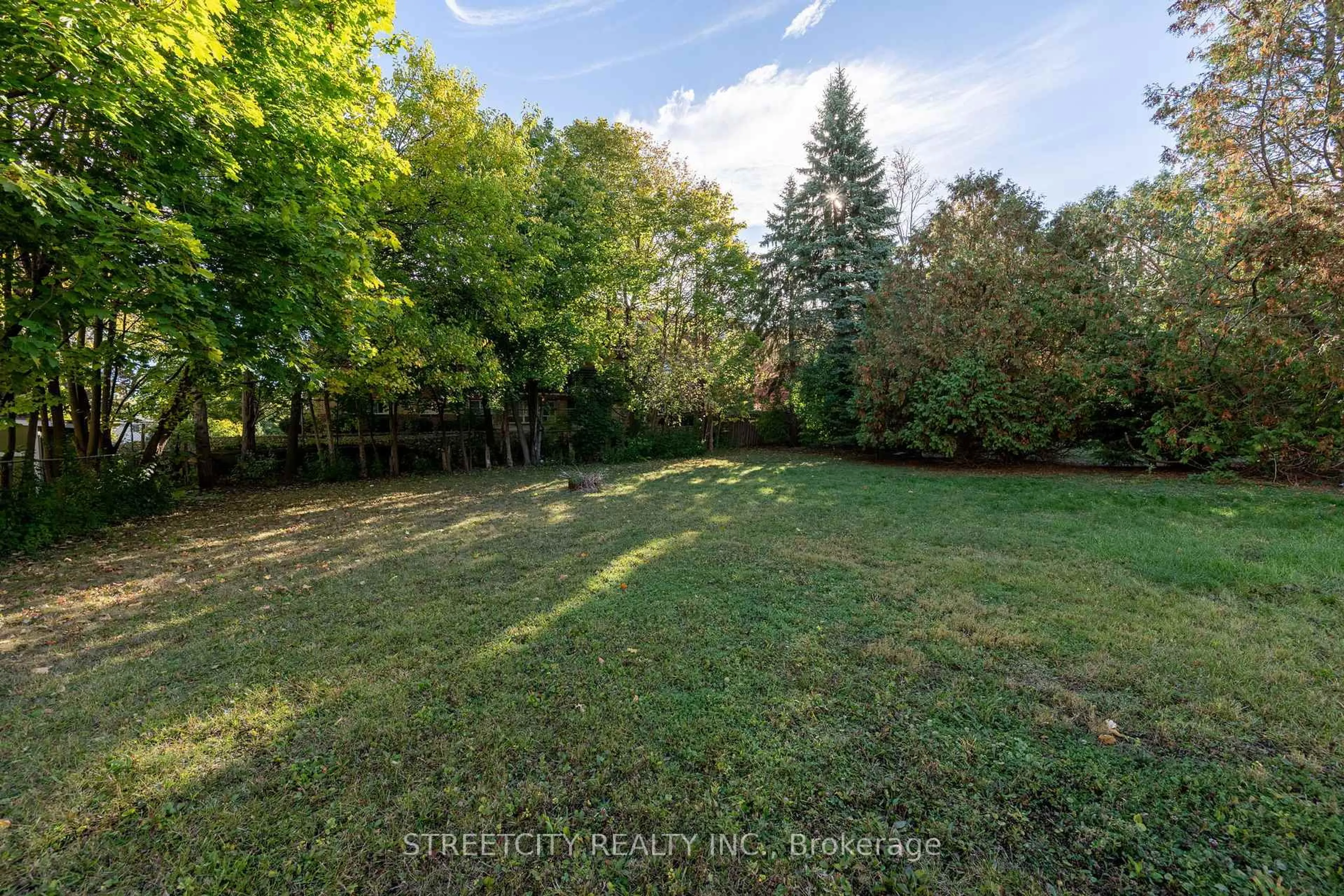 A pic from outside/outdoor area/front of a property/back of a property/a pic from drone, forest/trees view for 312 Fairview Ave, London South Ontario N6C 4T8