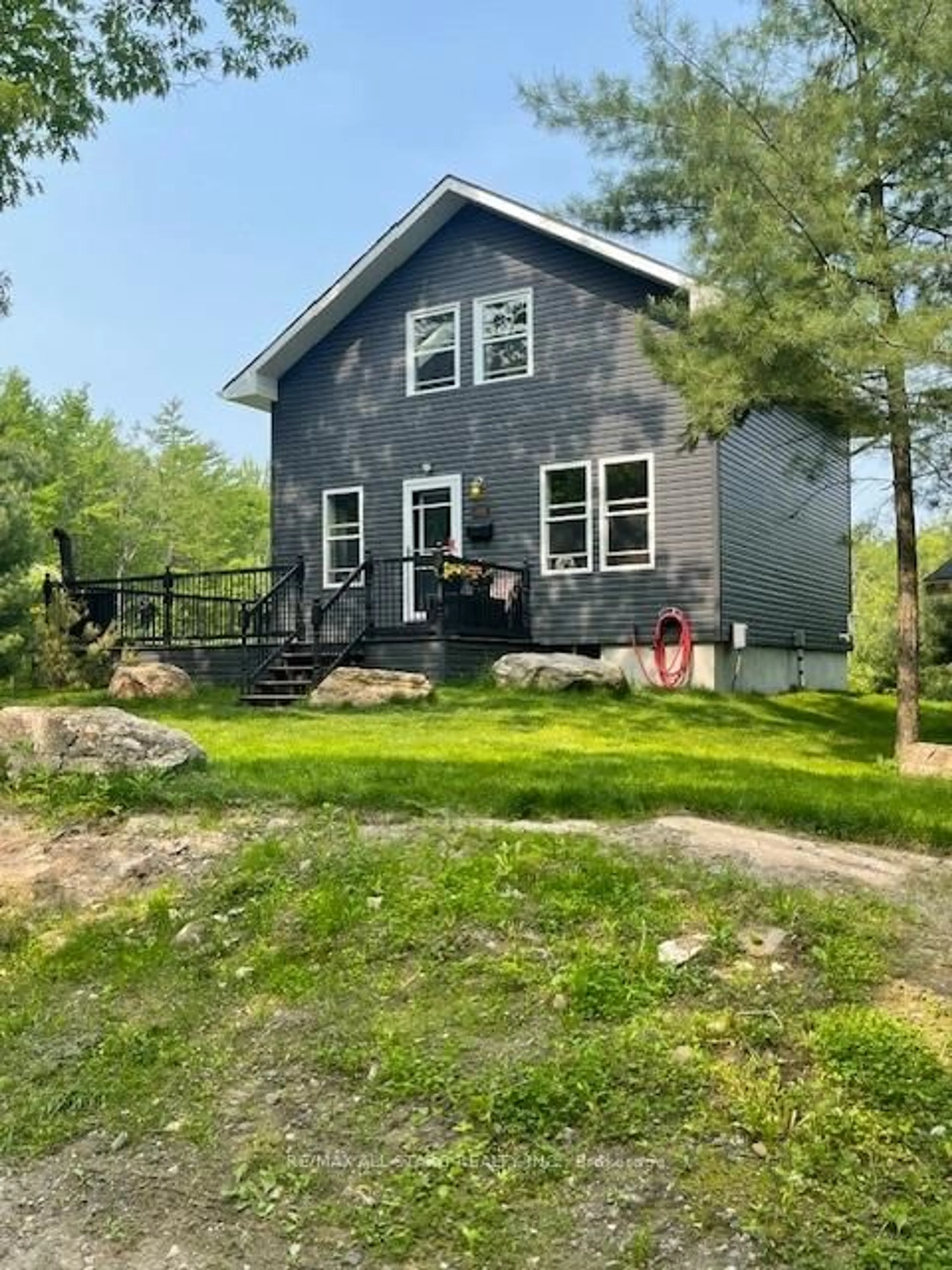 A pic from outside/outdoor area/front of a property/back of a property/a pic from drone, unknown for 1295 Deep Bay Rd, Minden Hills Ontario K0M 2L0