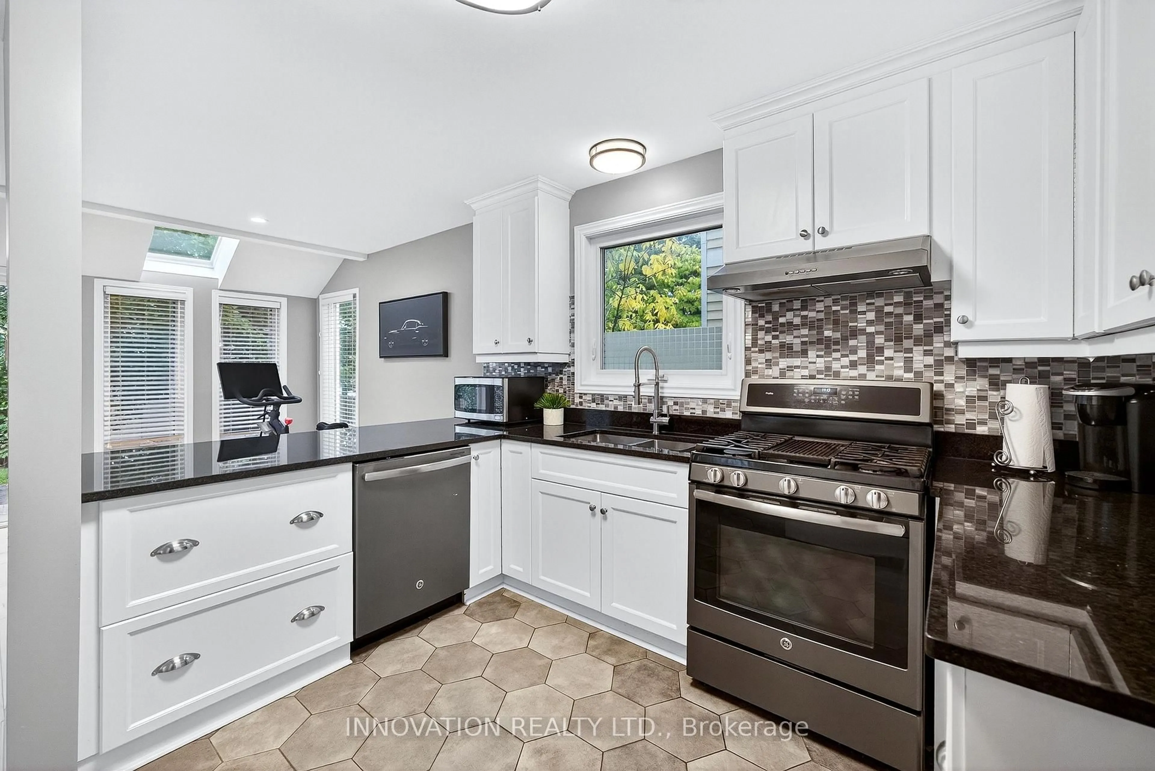 Open concept kitchen, ceramic/tile floor for 7 Hyannis Ave, Ottawa Ontario K2J 3H9